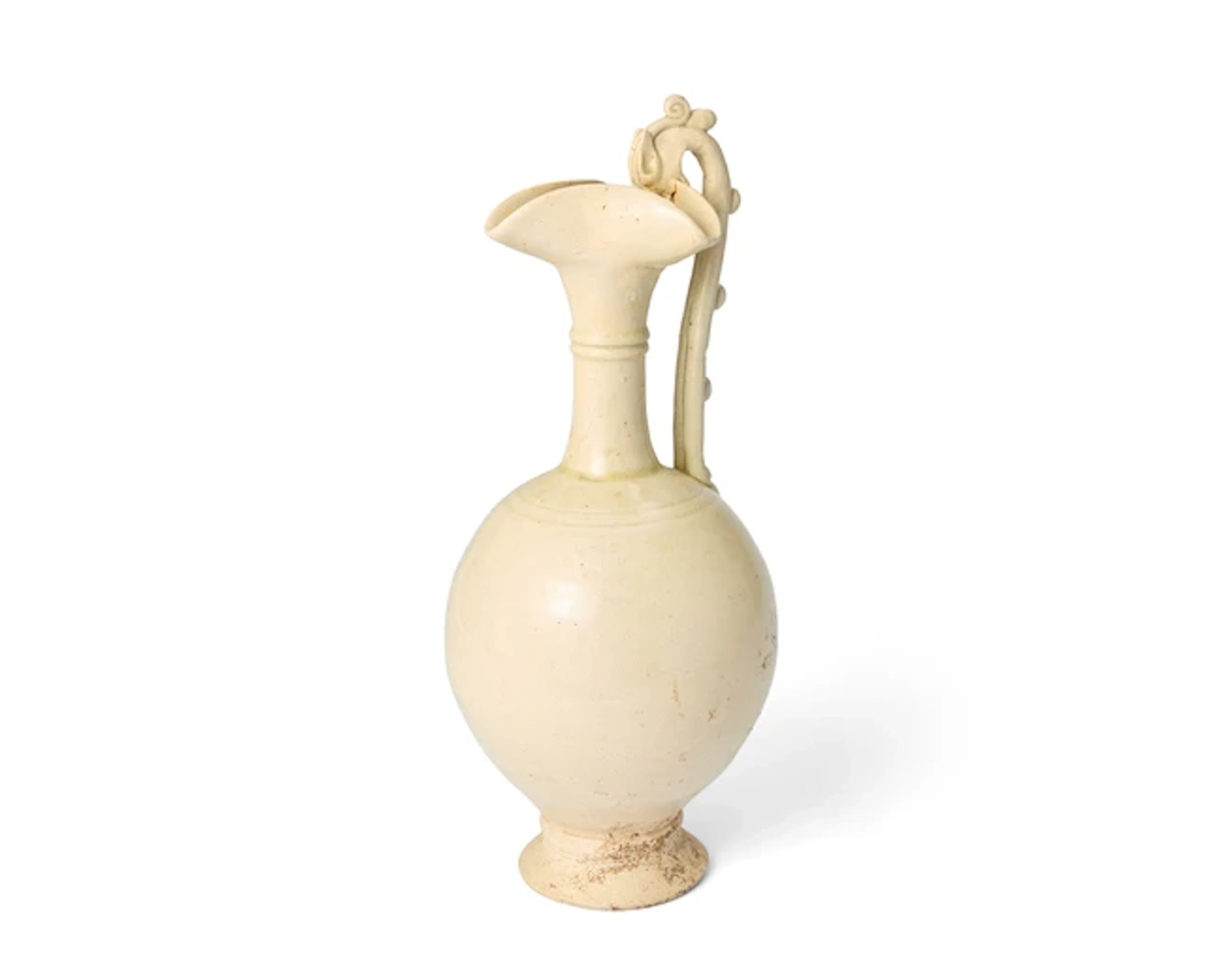 A Chinese white-glazed ewer Early Tang dynasty The...