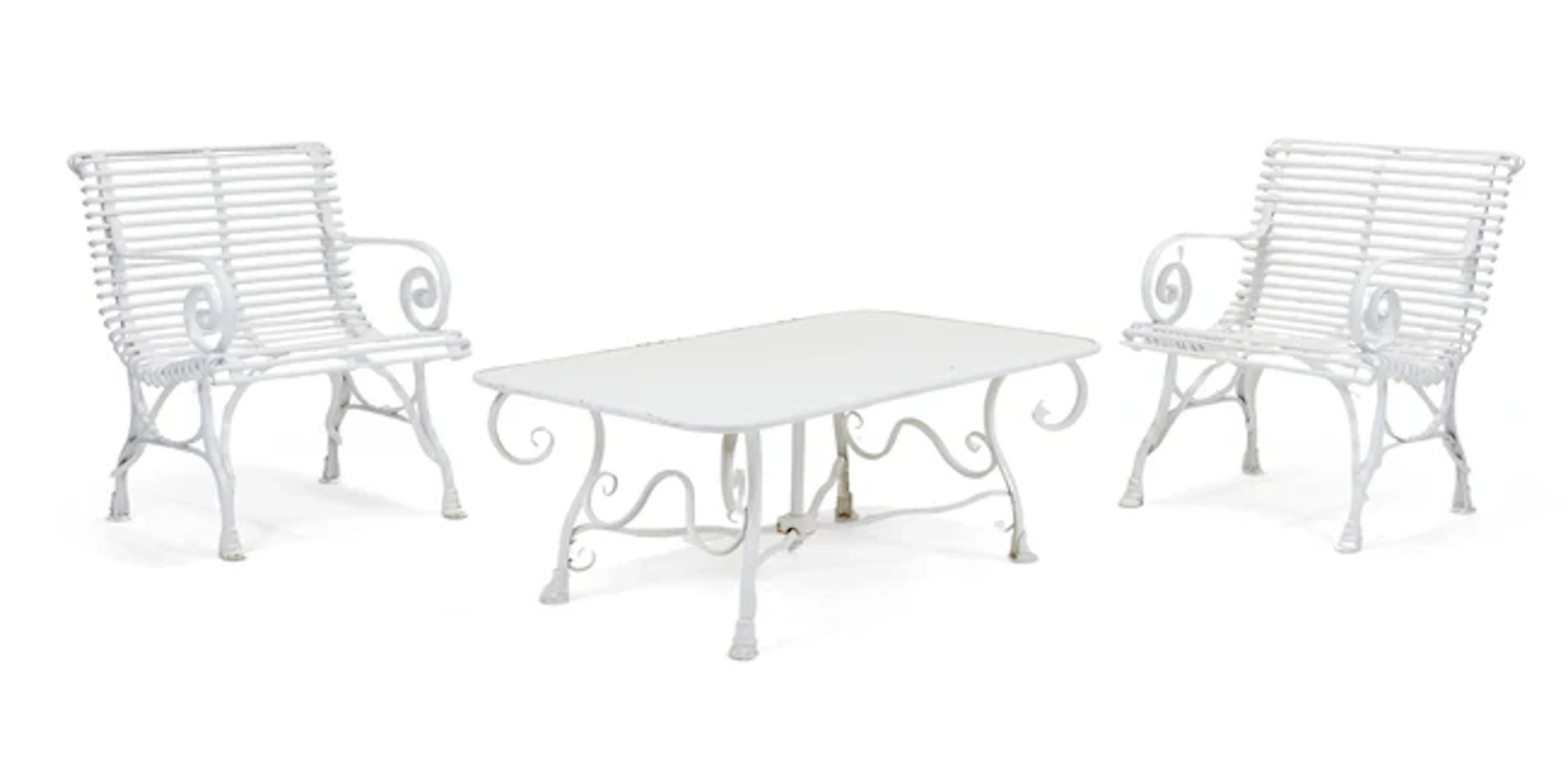 A pair of modern white-painted iron Arras style chairs