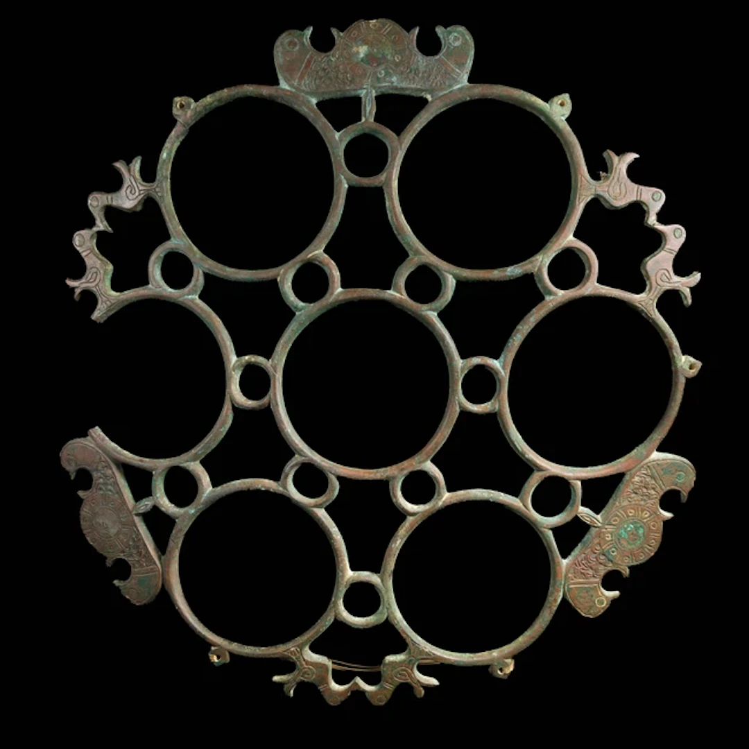 A bronze circular polycandelon