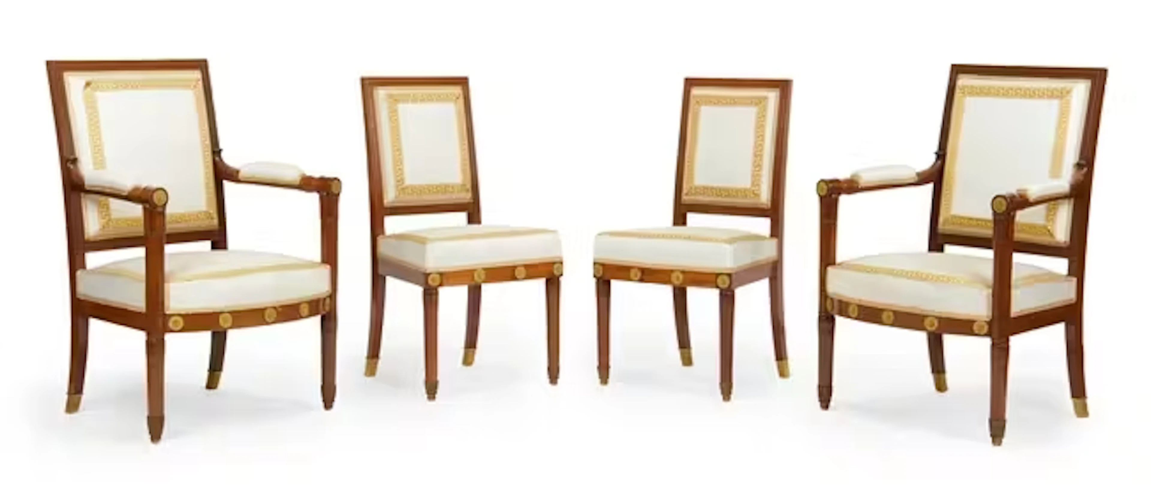 A set of four Empire ormolu mounted mahogany chairs