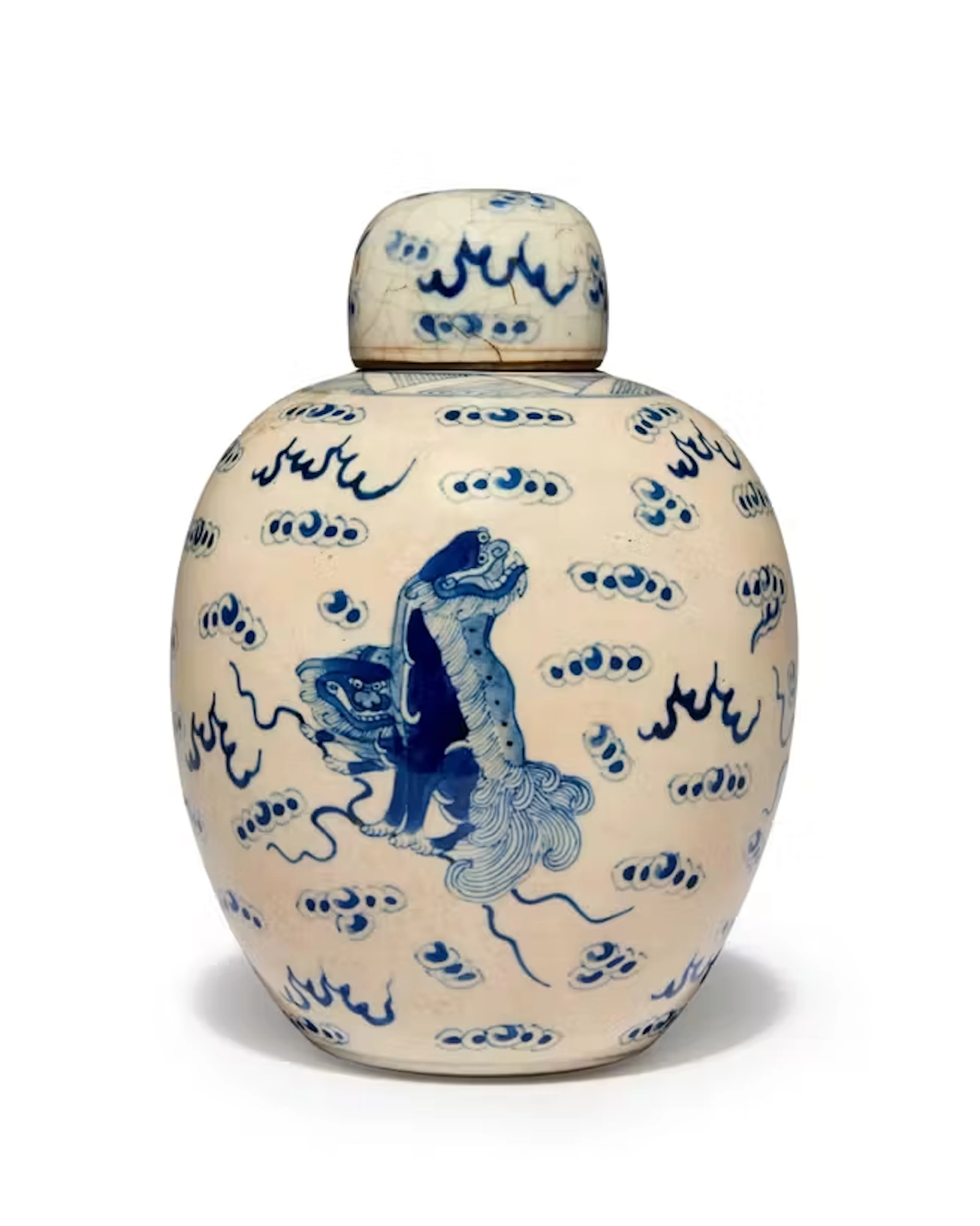 A Chinese soft paste 'lion dogs' jar and cover Qing dynasty