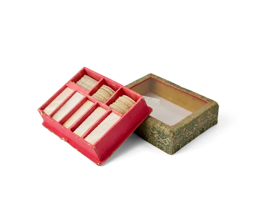 A box of Chinese mother of pearl counters Qing dynasty