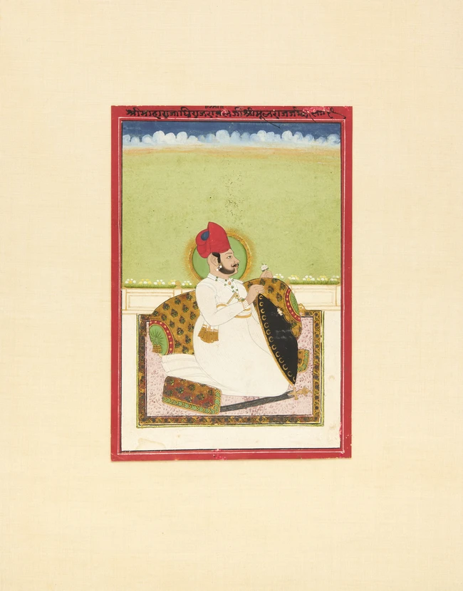 A seated portrait of a ruler