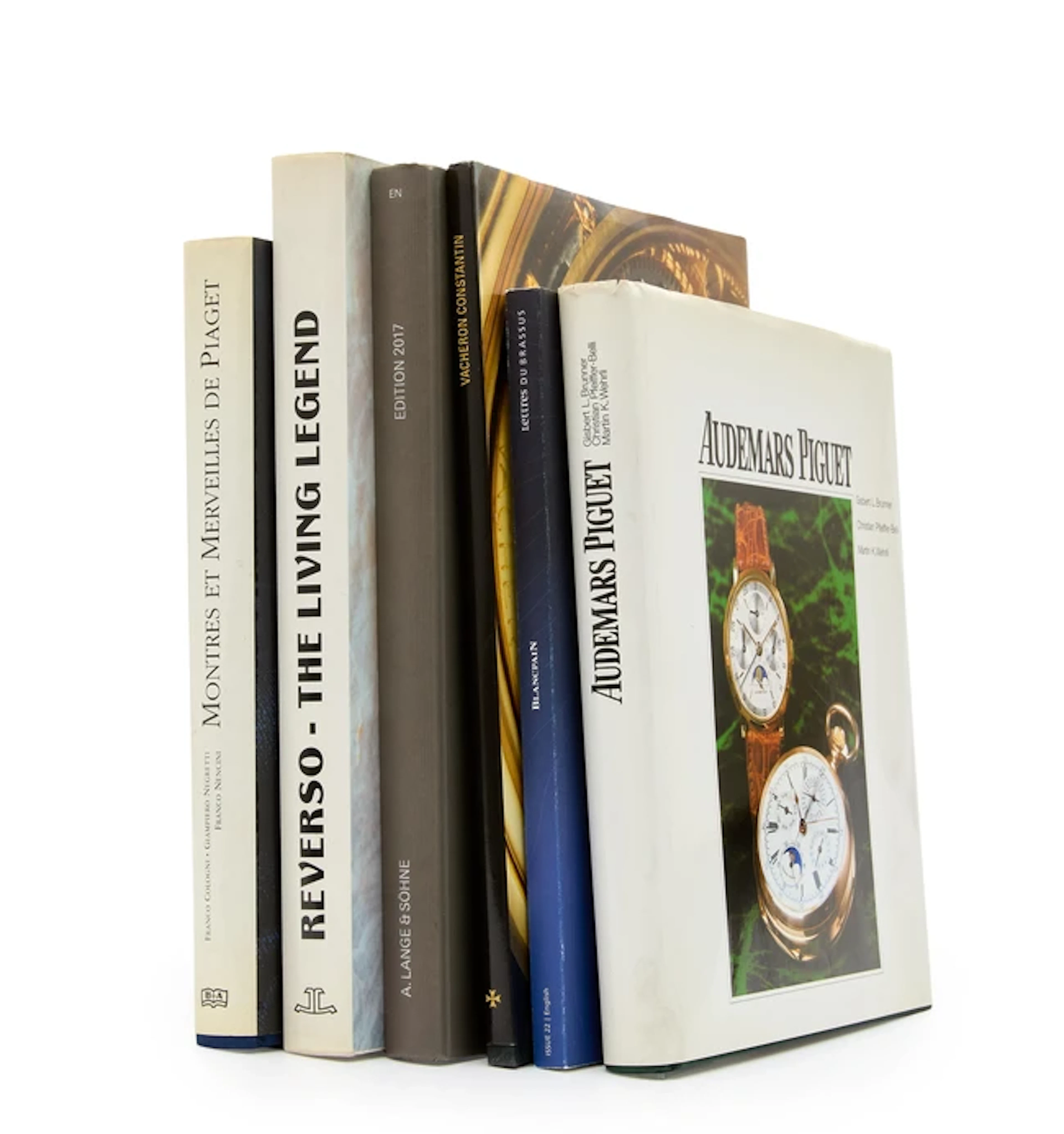 A group of watch books