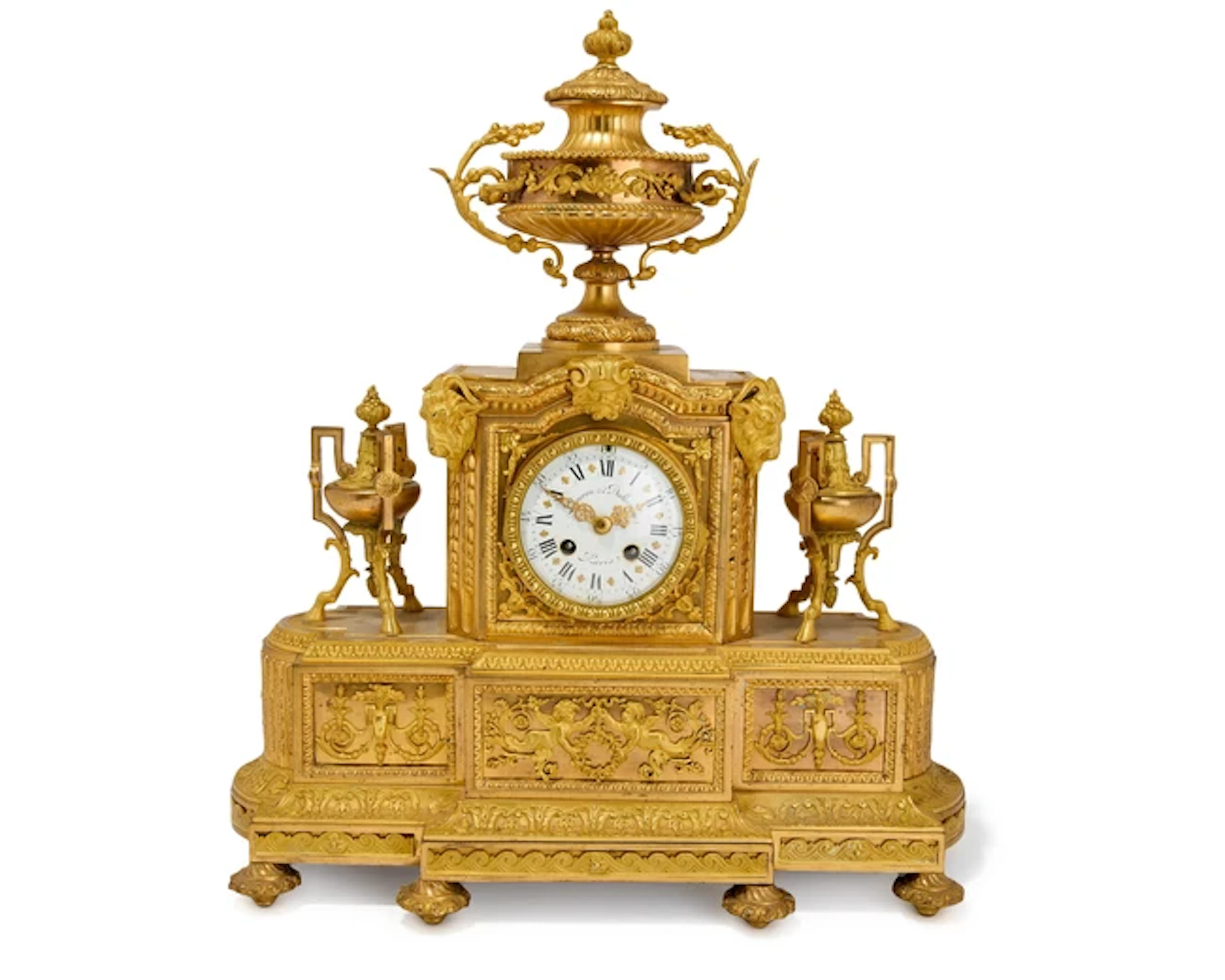A large French gilt-bronze mantel clock