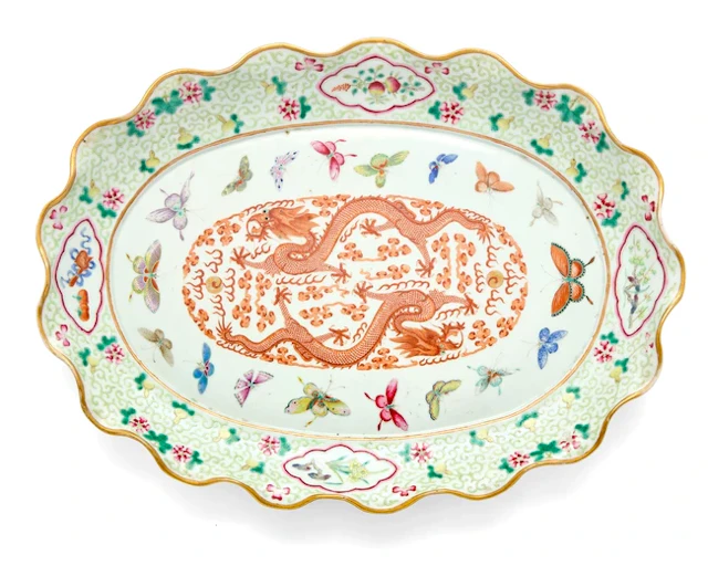 A large Chinese famille rose and iron red foliate rim oval dish Qing dynasty