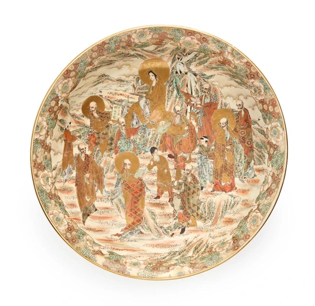 A large Japanese Satsuma 'Kannon and arakan' dish Meiji...