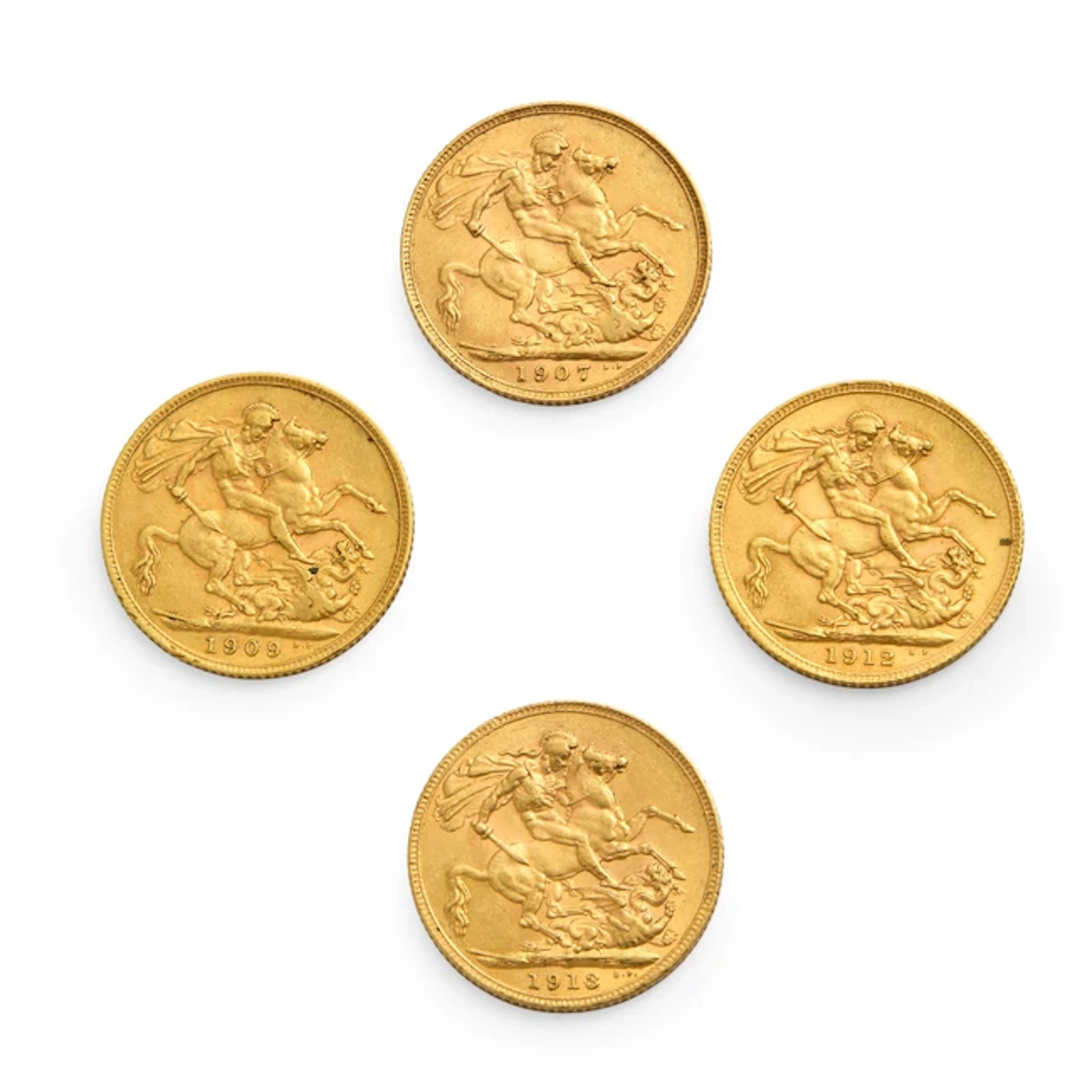 A group of four sovereign coins