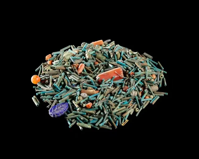 A large quantity of Egyptian turquoise glazed cylindrical mummy beads