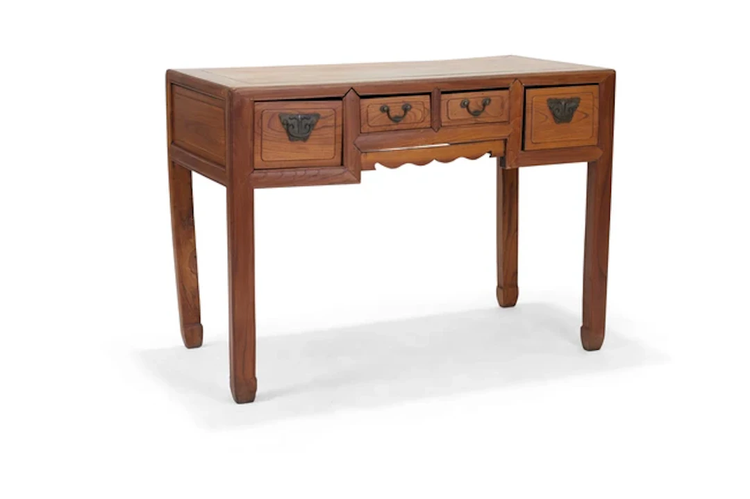 A Chinese softwood desk 20th century The table mounted...