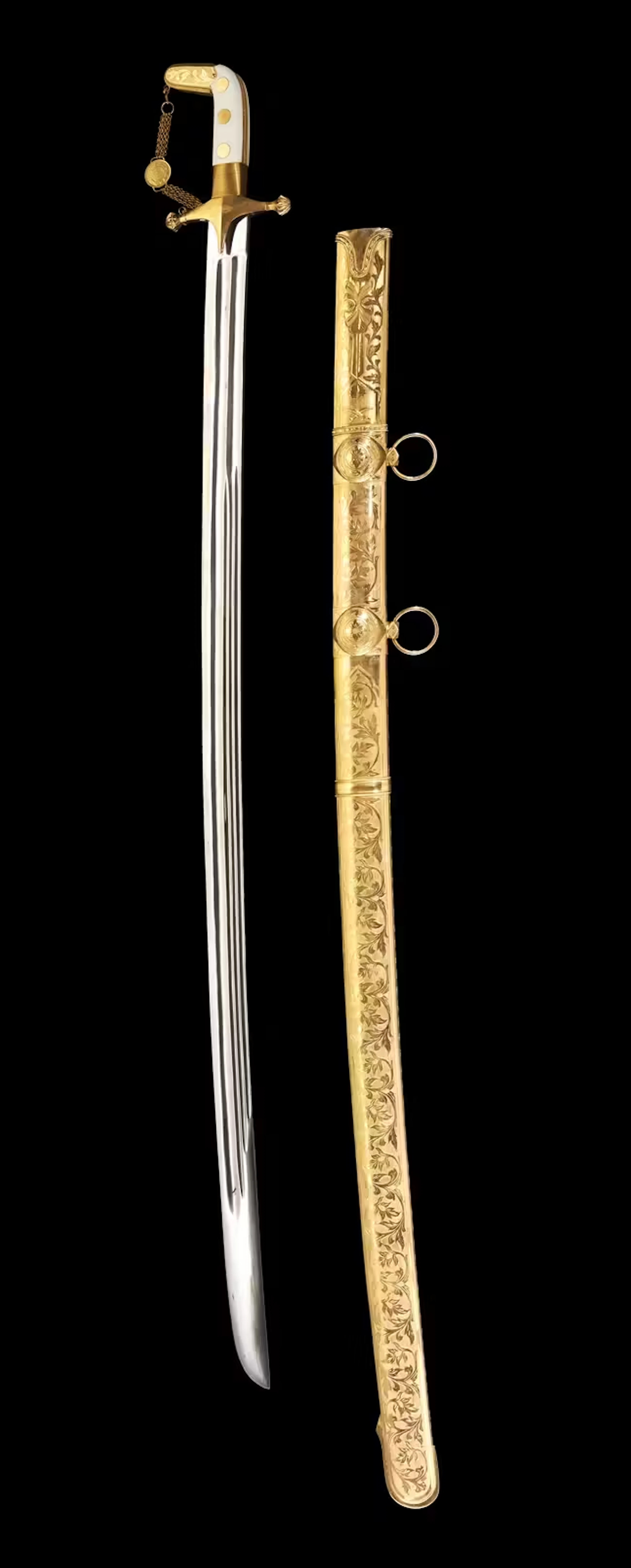 A presentation sword (saif) with bone hilt and gold fittings