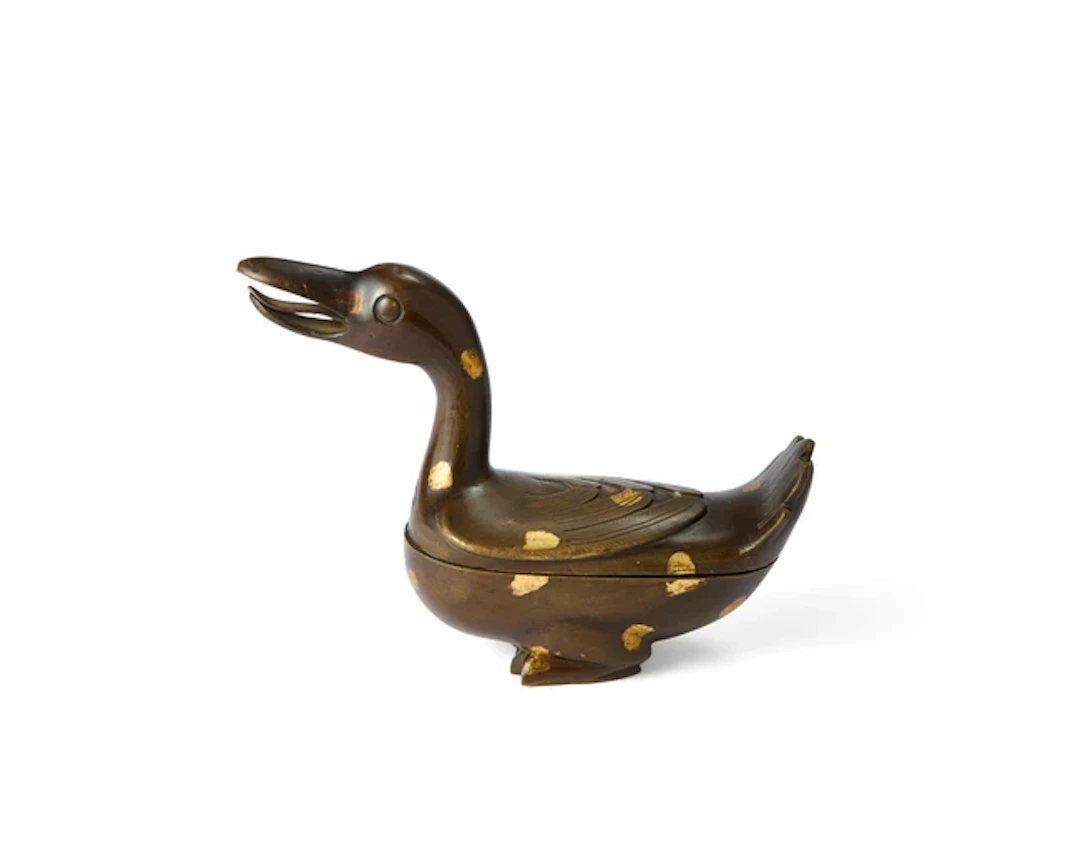 A small Chinese gilt-splashed bronze 'duck' incense burner Qing dynasty