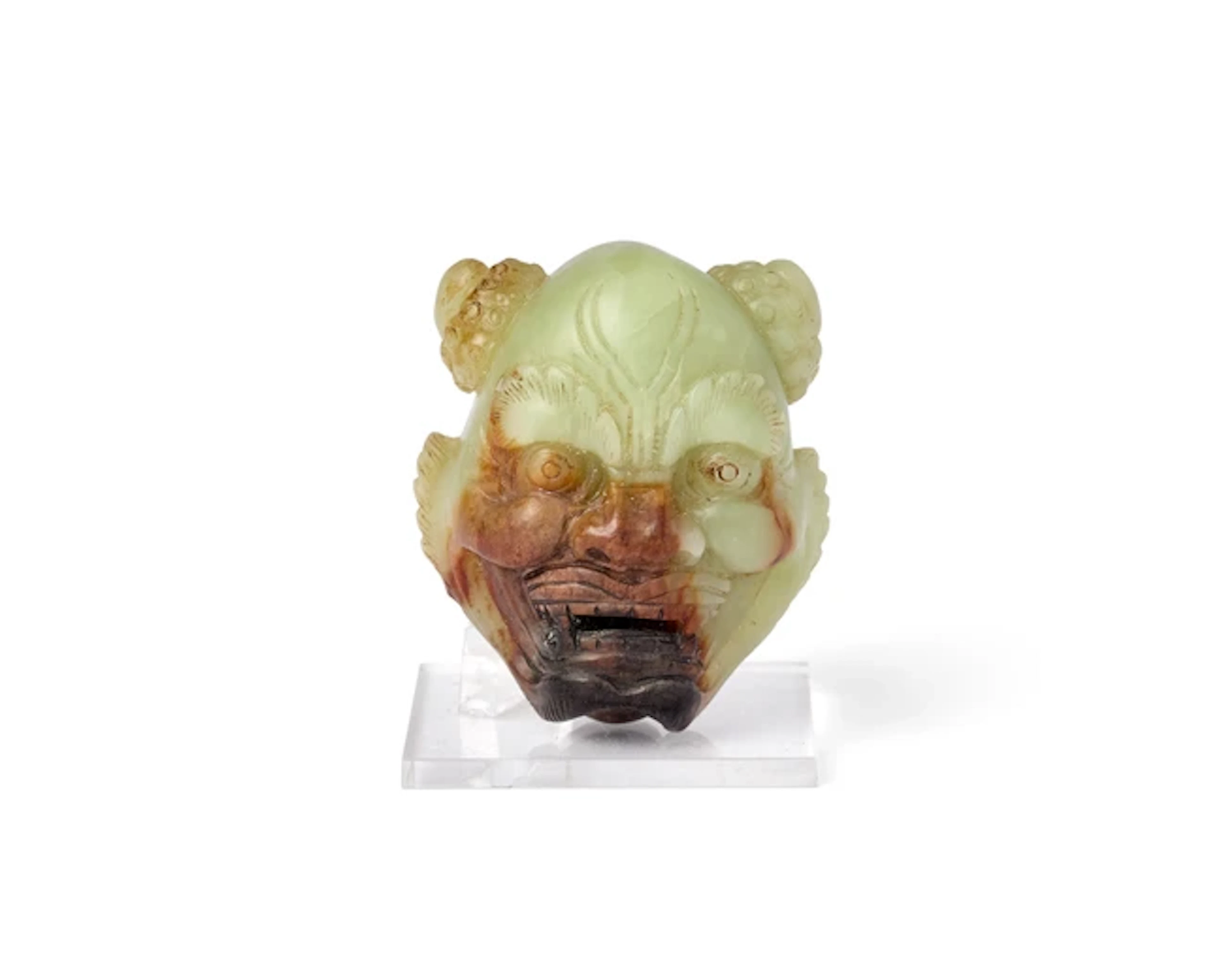 A Chinese carved russet celadon jade 'monster' belt...