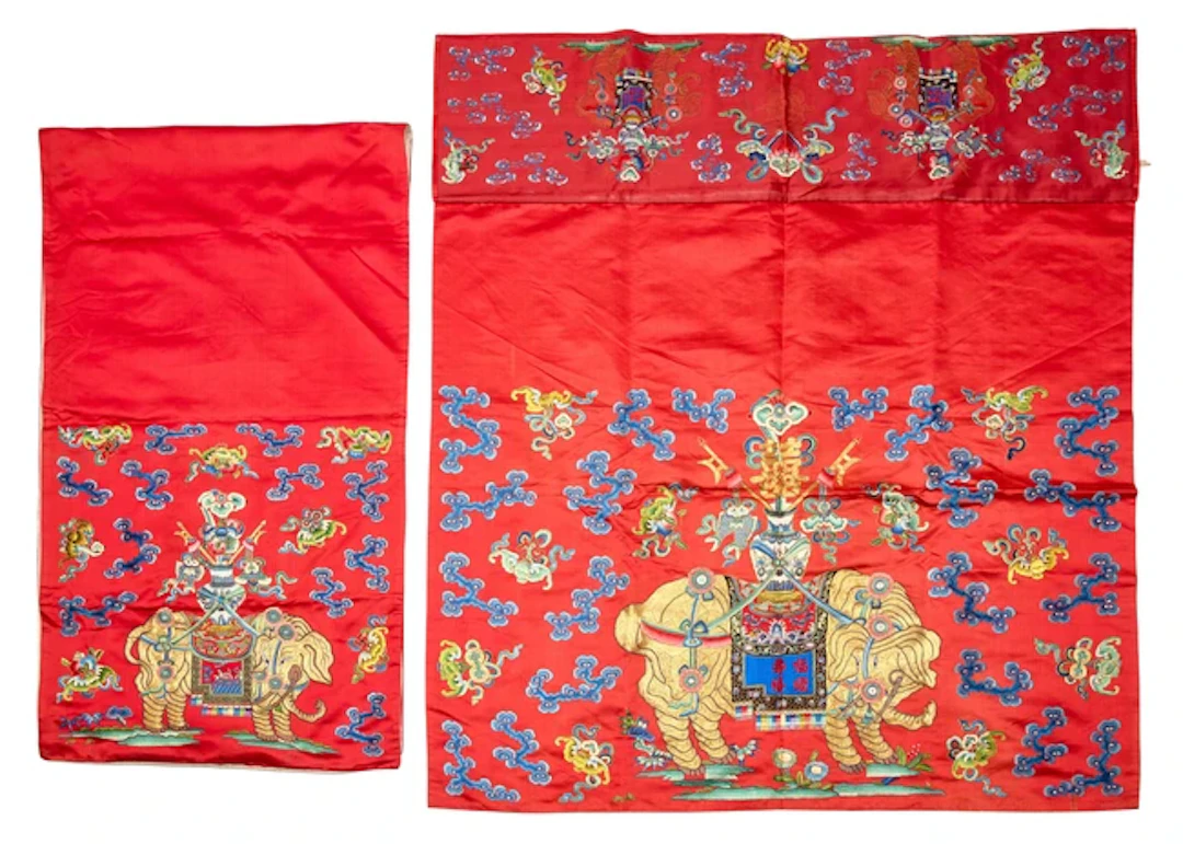 A Chinese embroidered red silk 'wedding' chair and table...