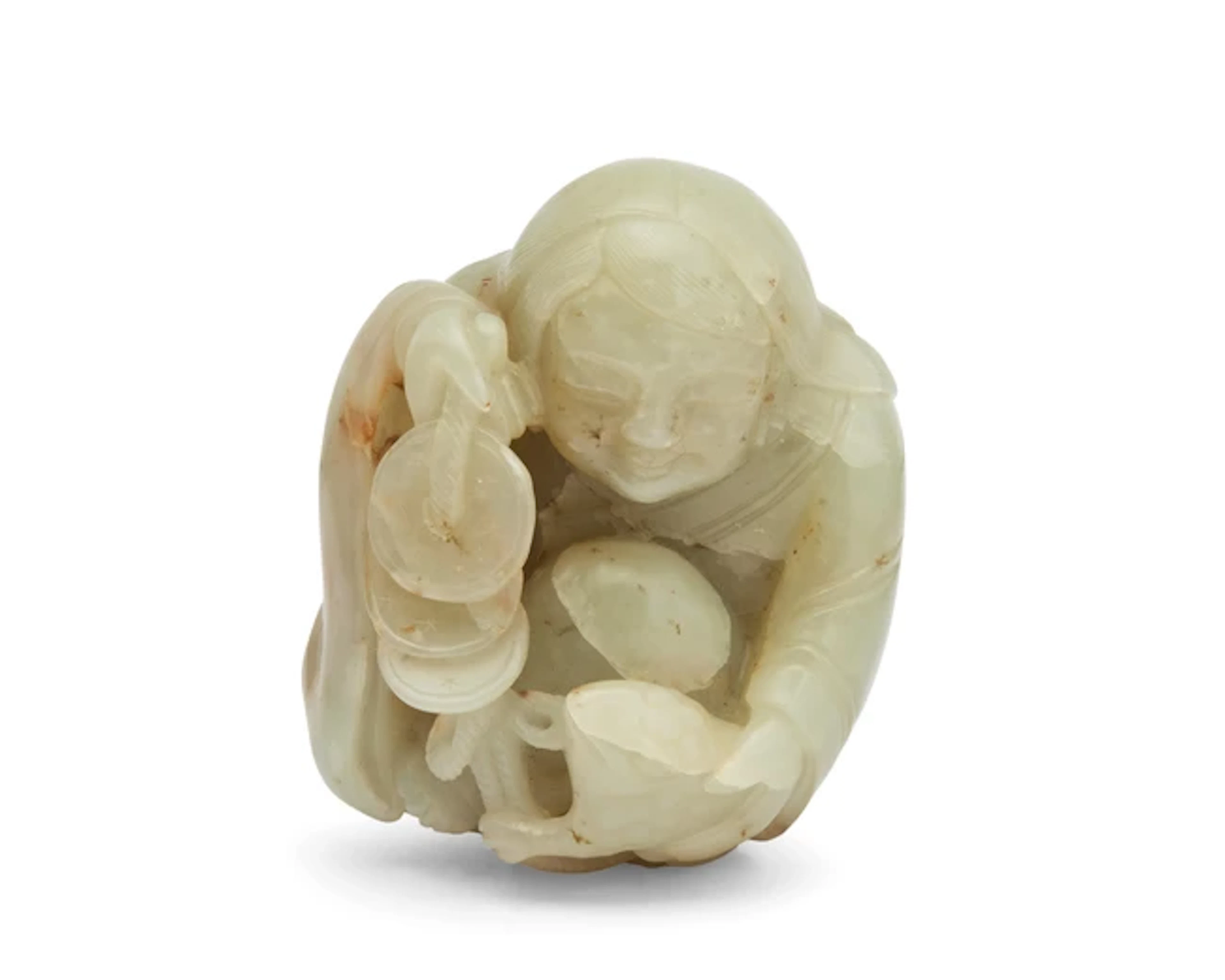 A Chinese green jade carving of Liu Hai and his toad Qing dynasty