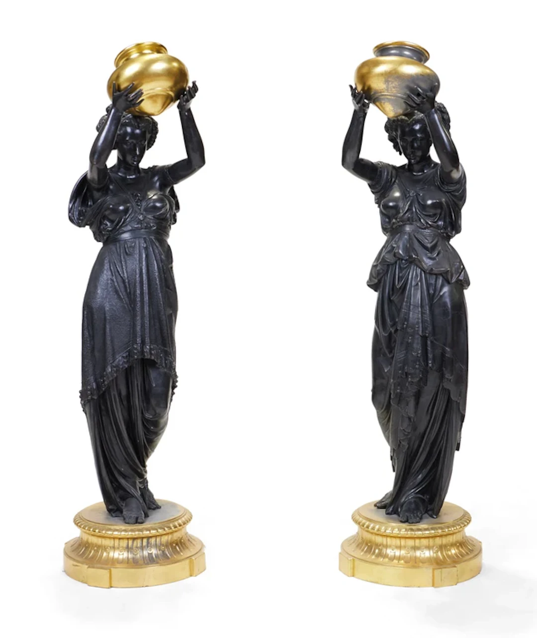 A pair of modern gilt and patinated metal standing maidens