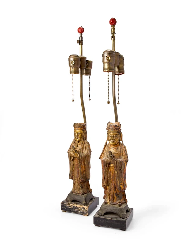 A near pair of Chinese gilt bronze figures of officials...