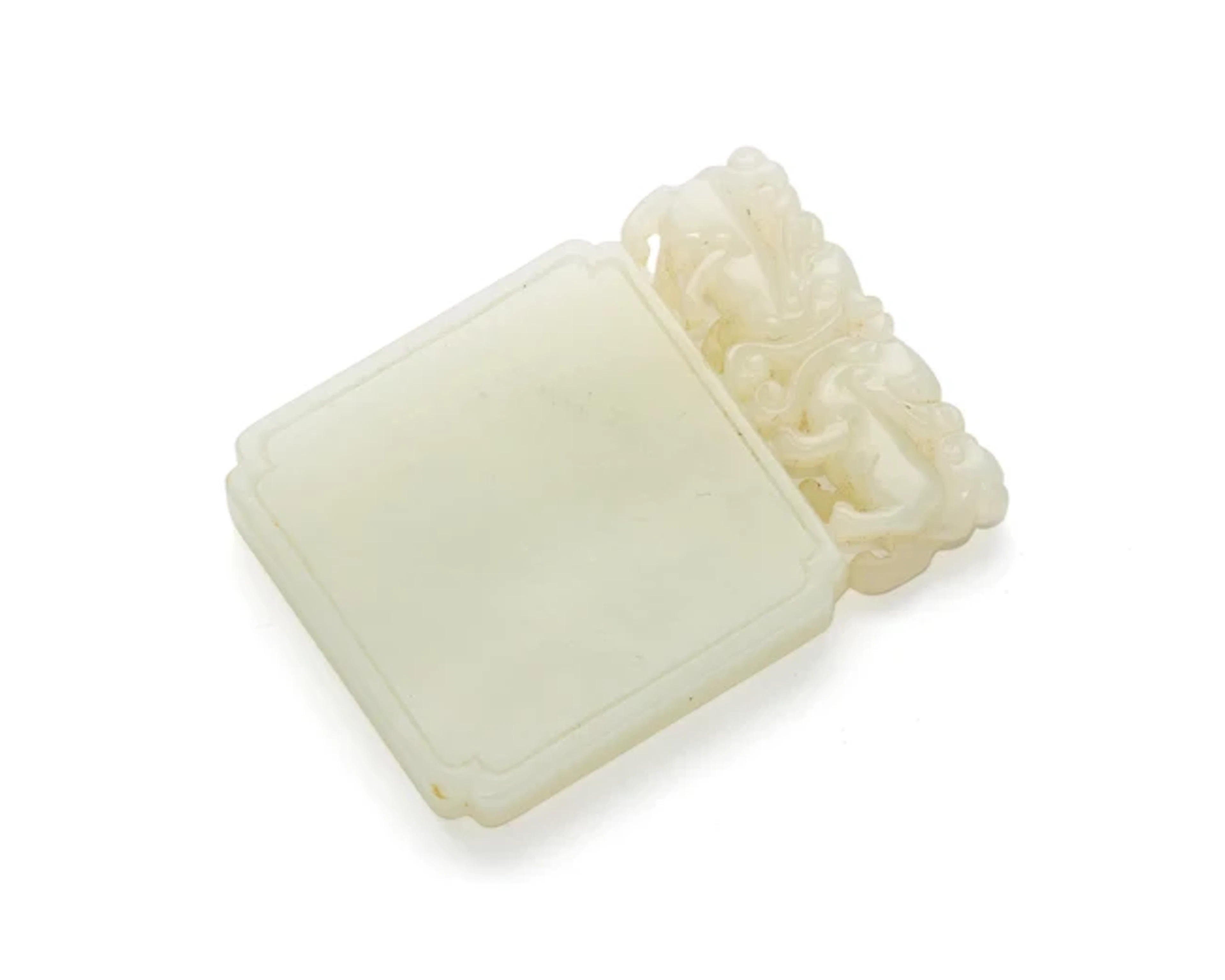 A Chinese white jade ‘amulet of peace' pendant