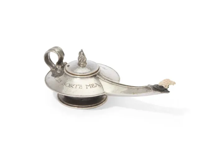 An Arts & Crafts silver table lighter