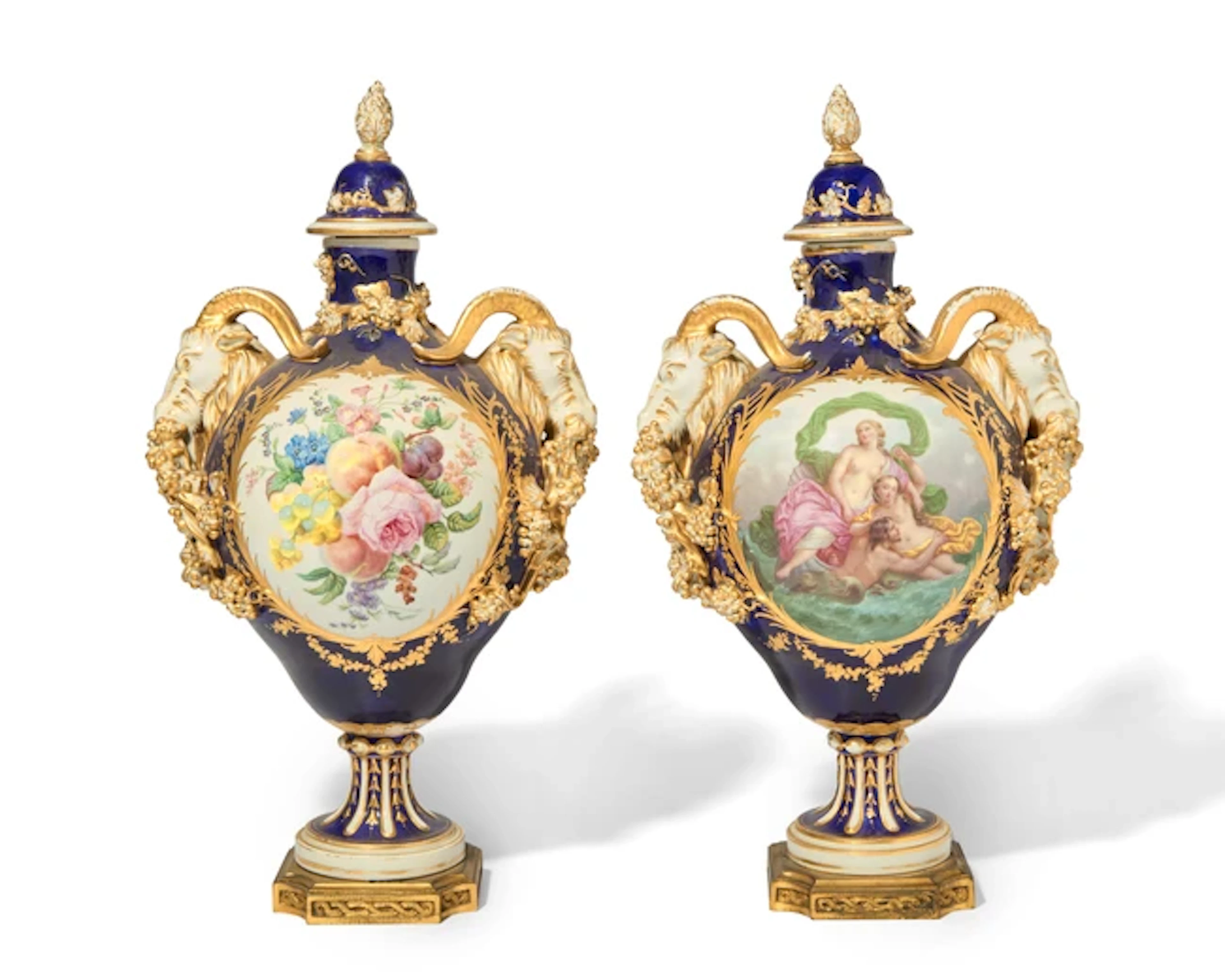 A pair of gilt-metal mounted Sèvres style vases and covers