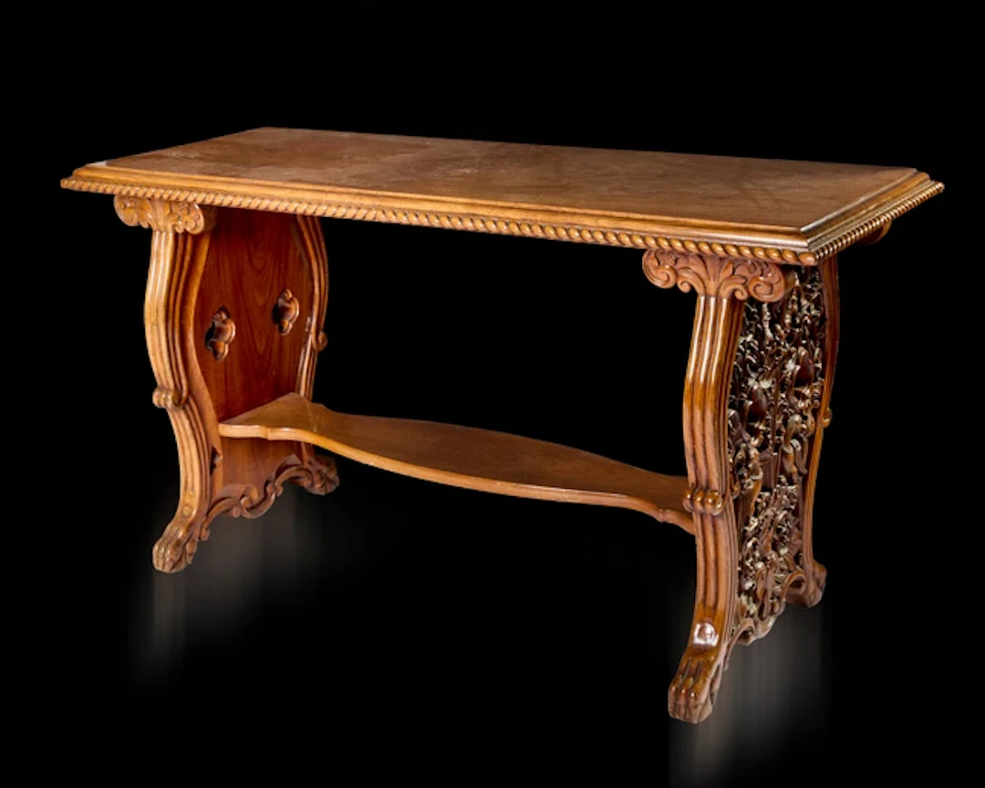 An Anglo-Indian rectangular carved rosewood writing table