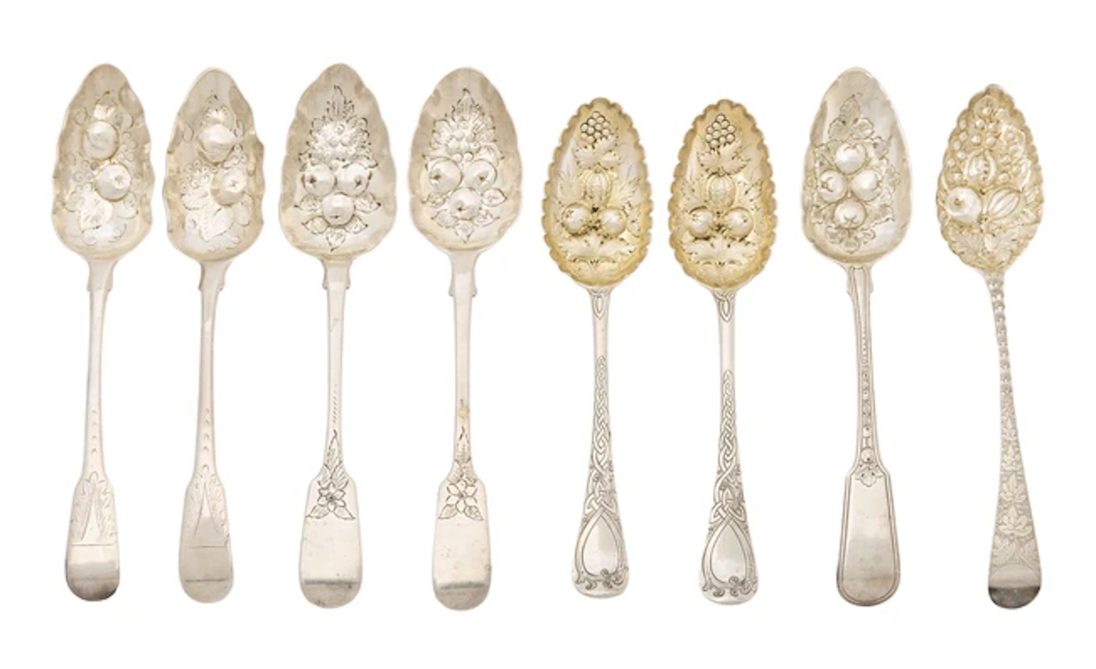 A selection of Georgian and later silver berry spoons