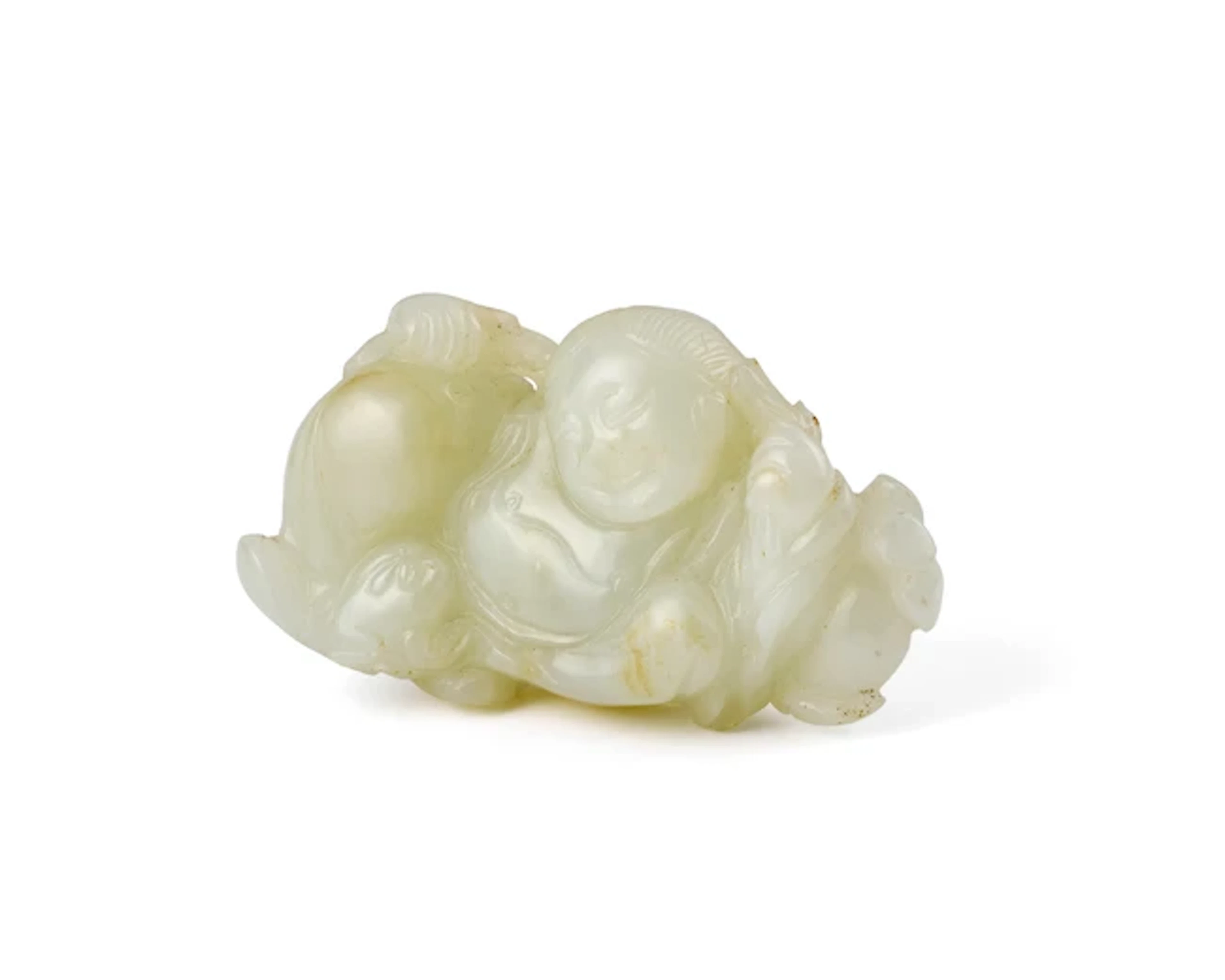 A Chinese pale celadon jade carving of Liu Hai and toad Qing dynasty