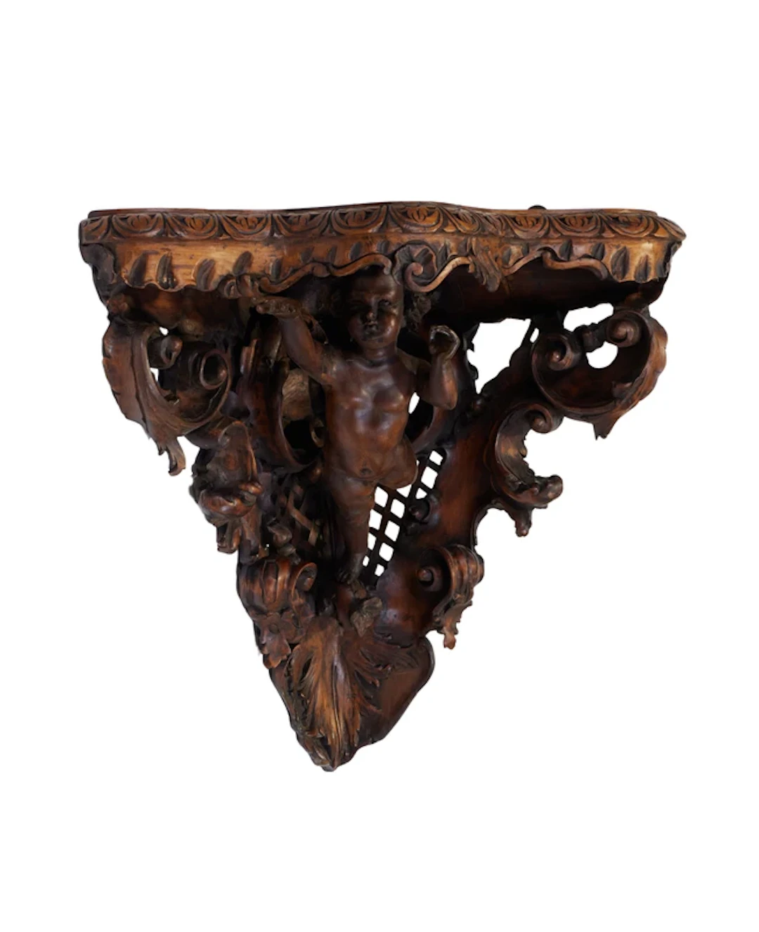 An Italian carved walnut corner wall bracket