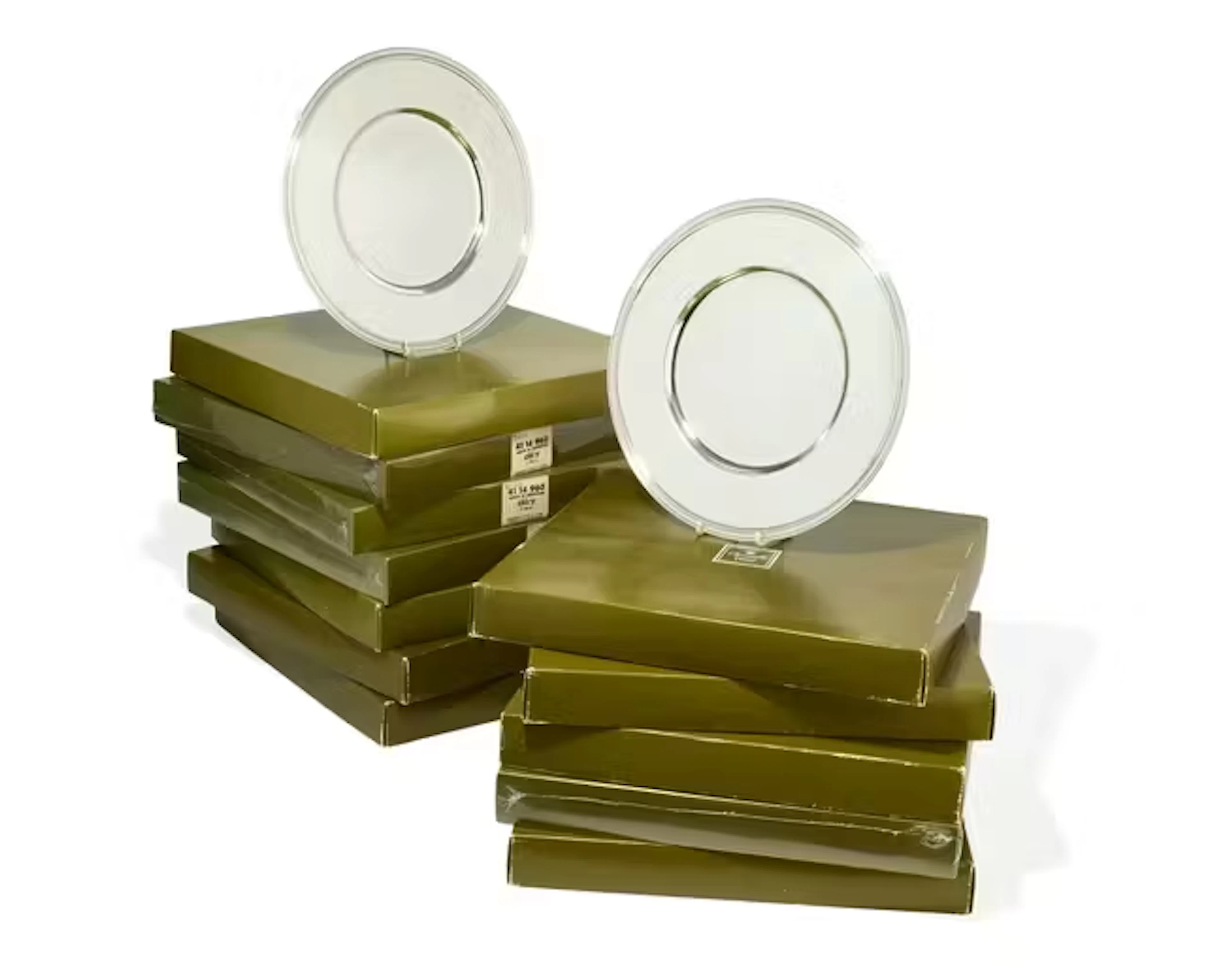 A set of twelve silver-plated underplates in original boxes