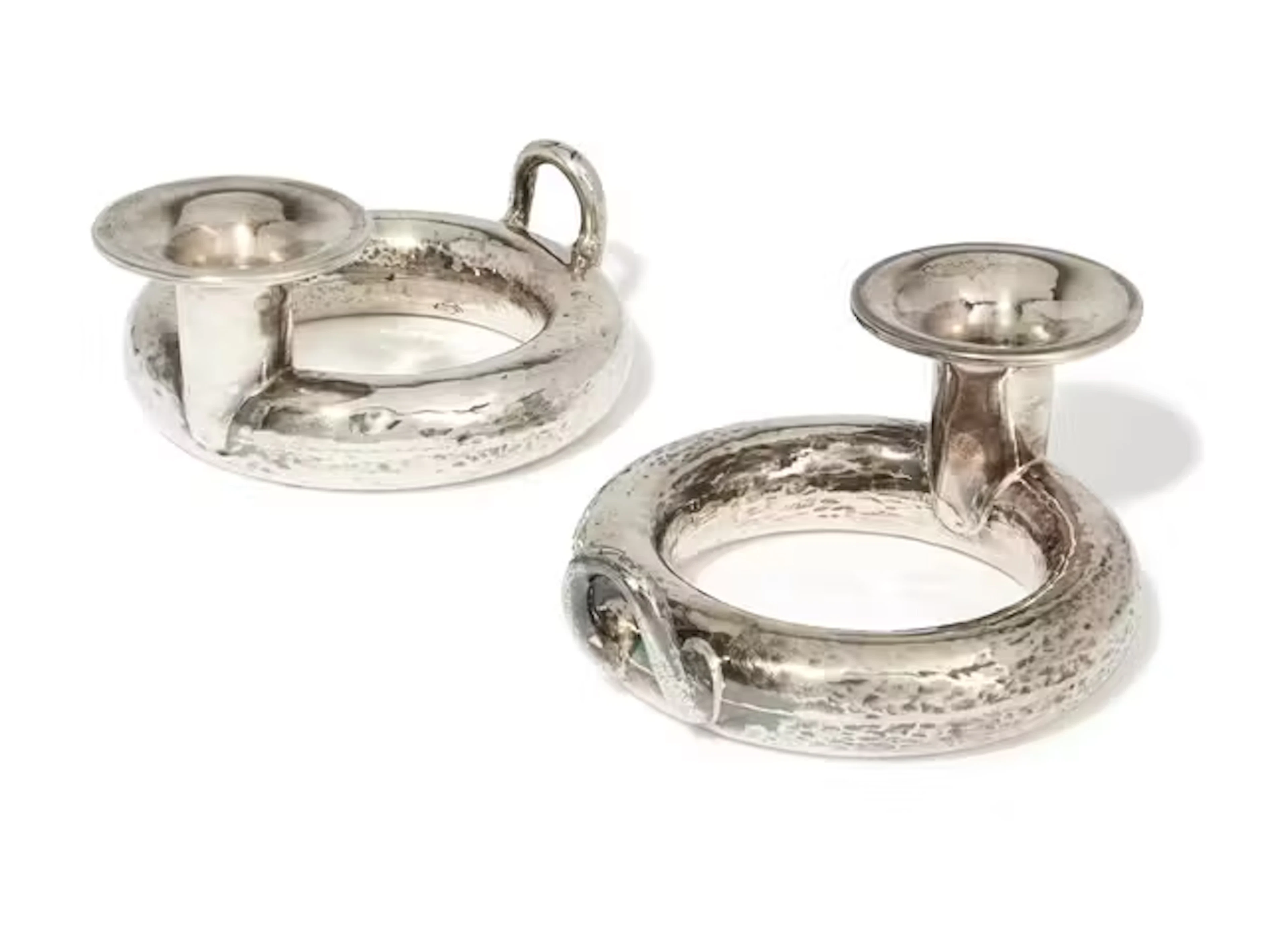 A pair of Greek silver candlesticks