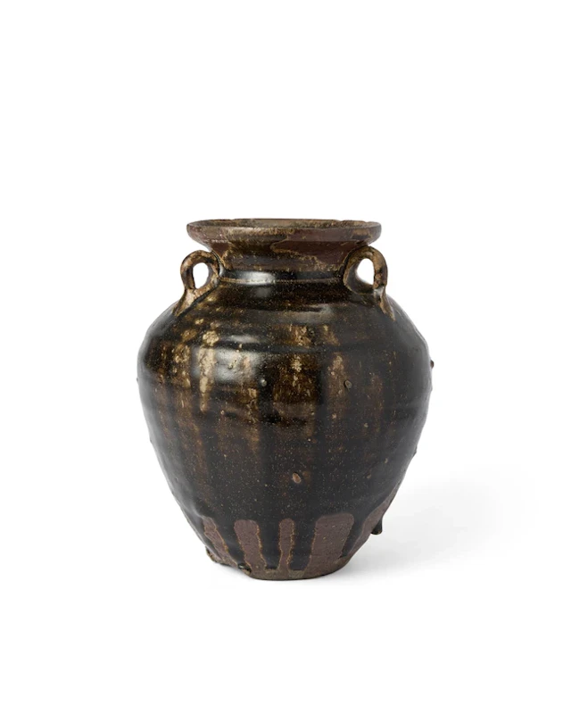 A Khmer brown-glazed jar 13th century The lower body unglazed