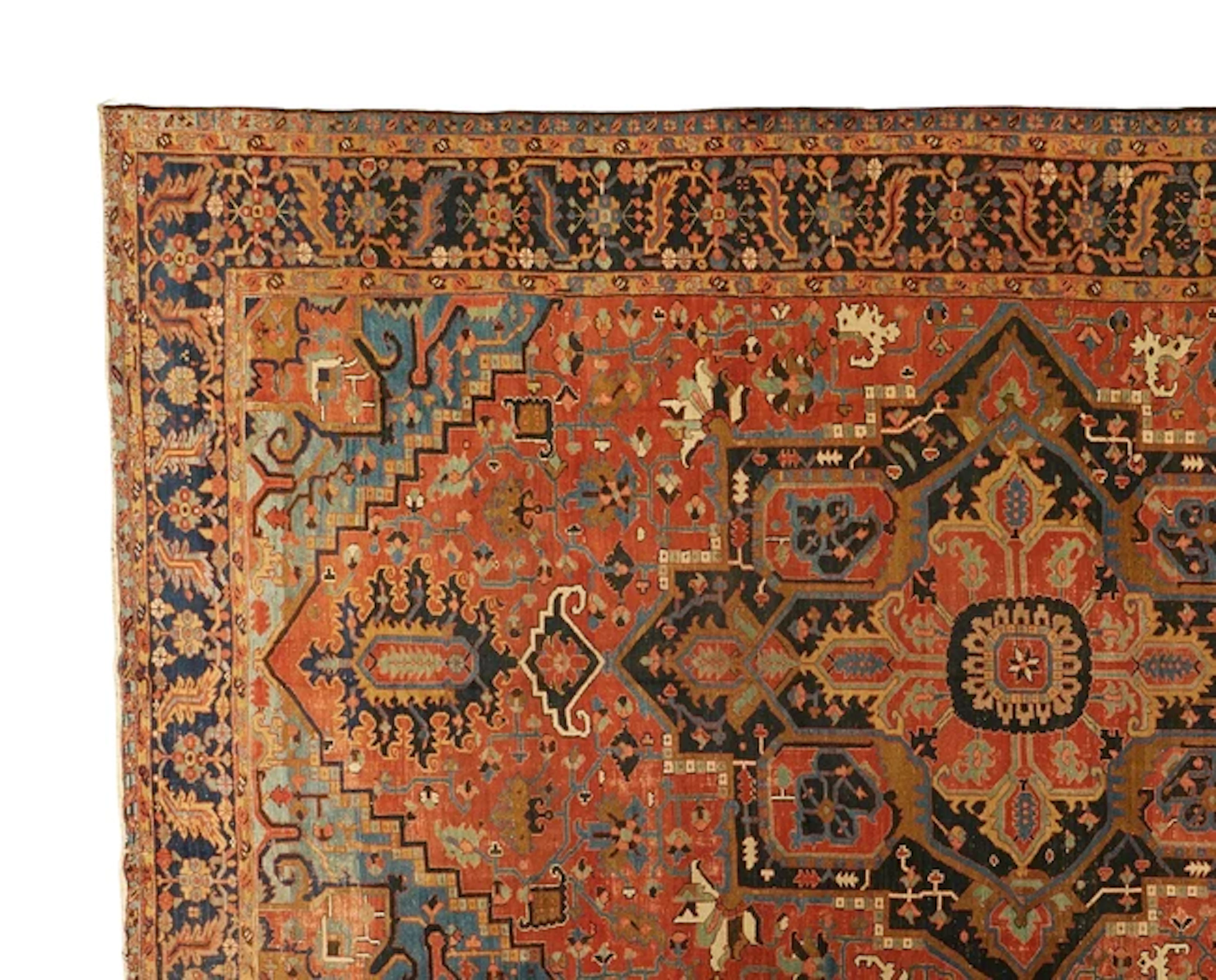 A large Persian Heriz carpet