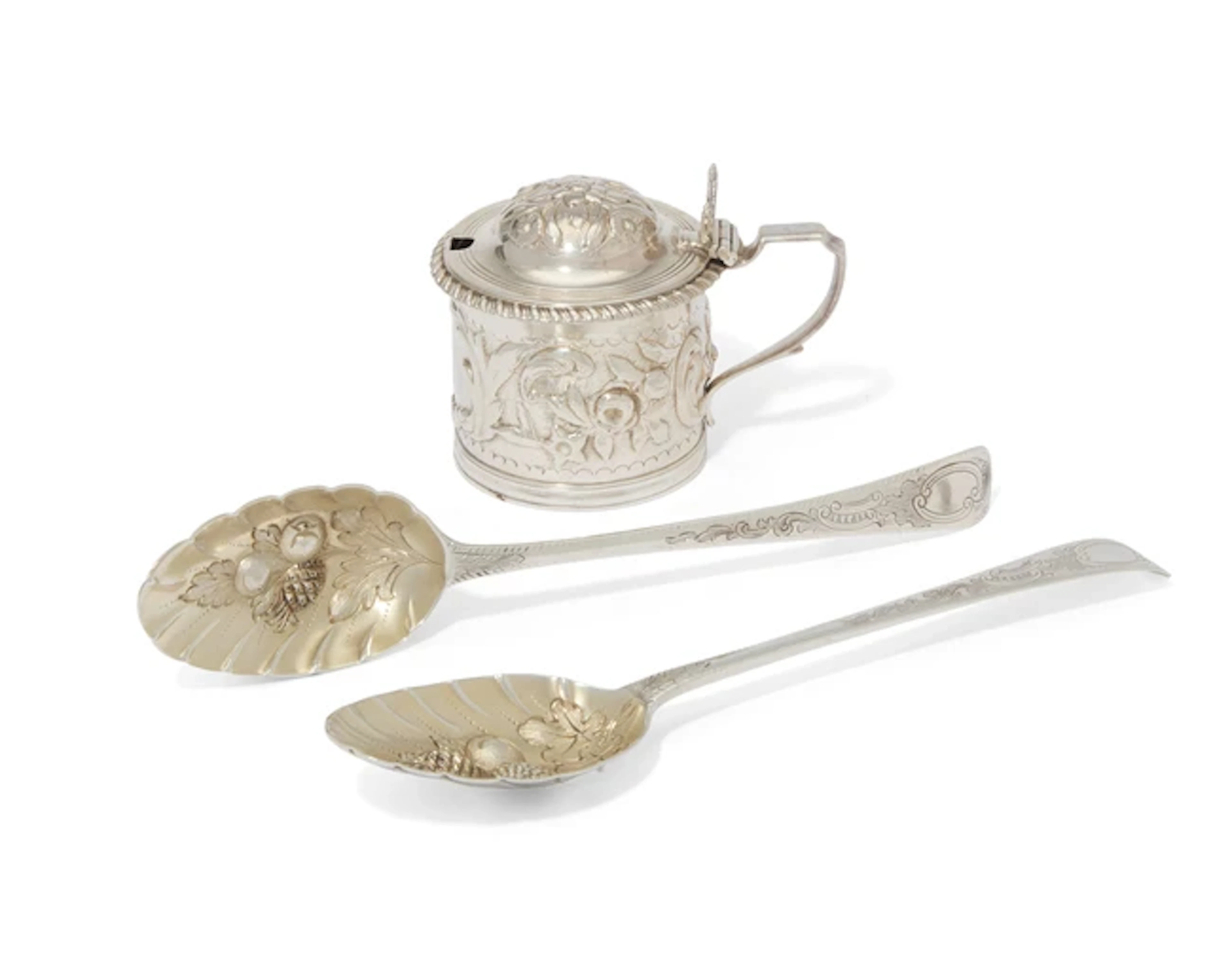 A pair of George III silver berry spoons
