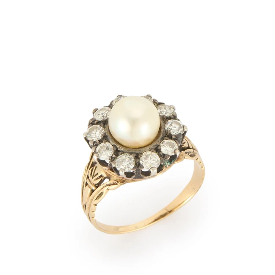 A cultured pearl and diamond cluster ring