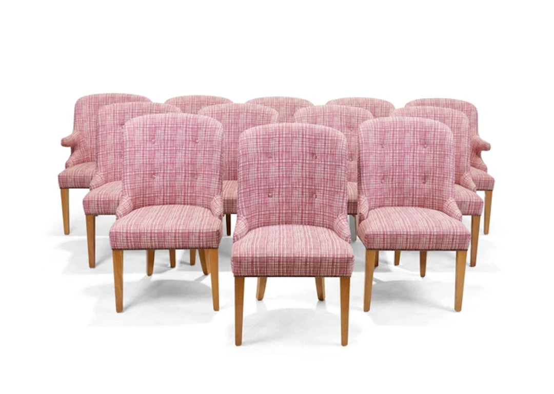 A set of twelve modern light oak framed and upholstered dining chairs (12)