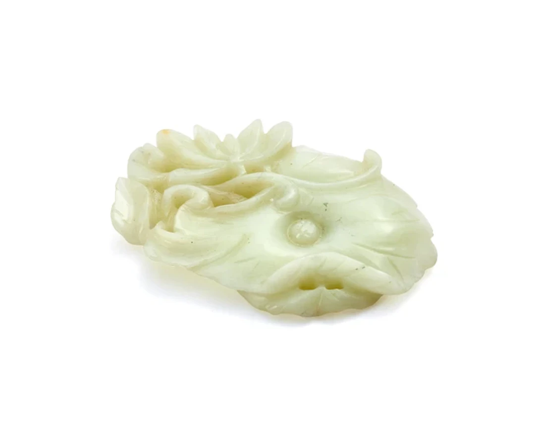 A Chinese pale jade reticulated plaque Republic period...