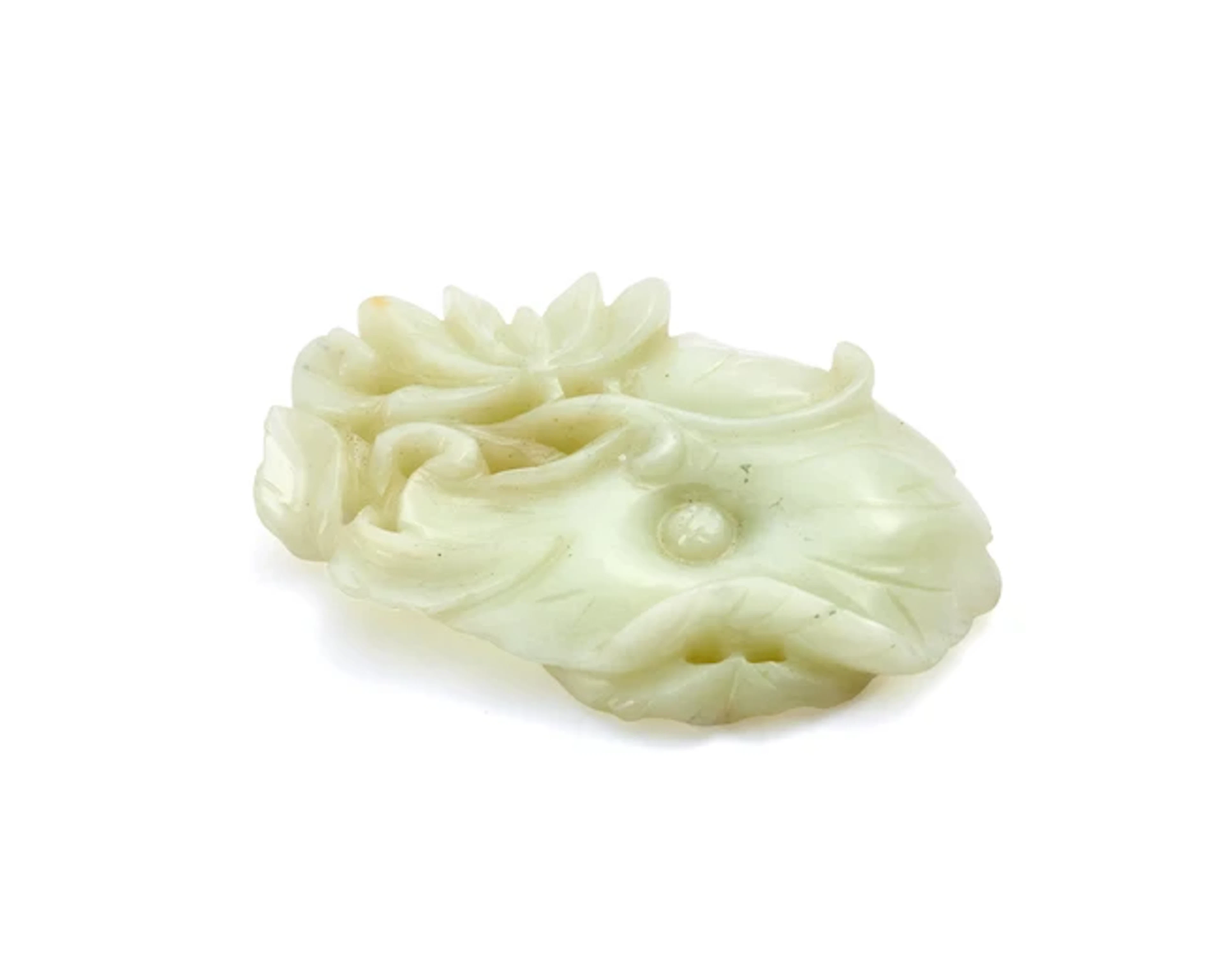 A Chinese pale jade reticulated plaque Republic period...