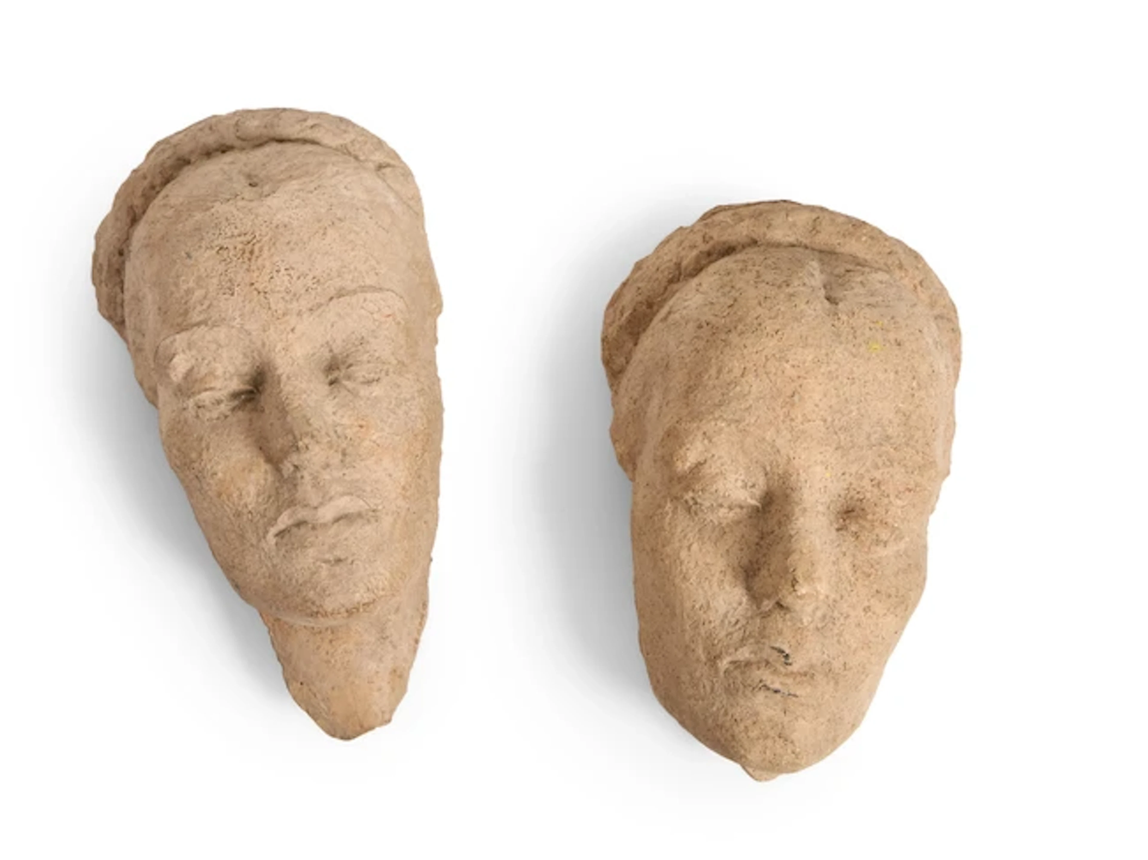 Salomé Venard (1904-1987) Pair of wall masks