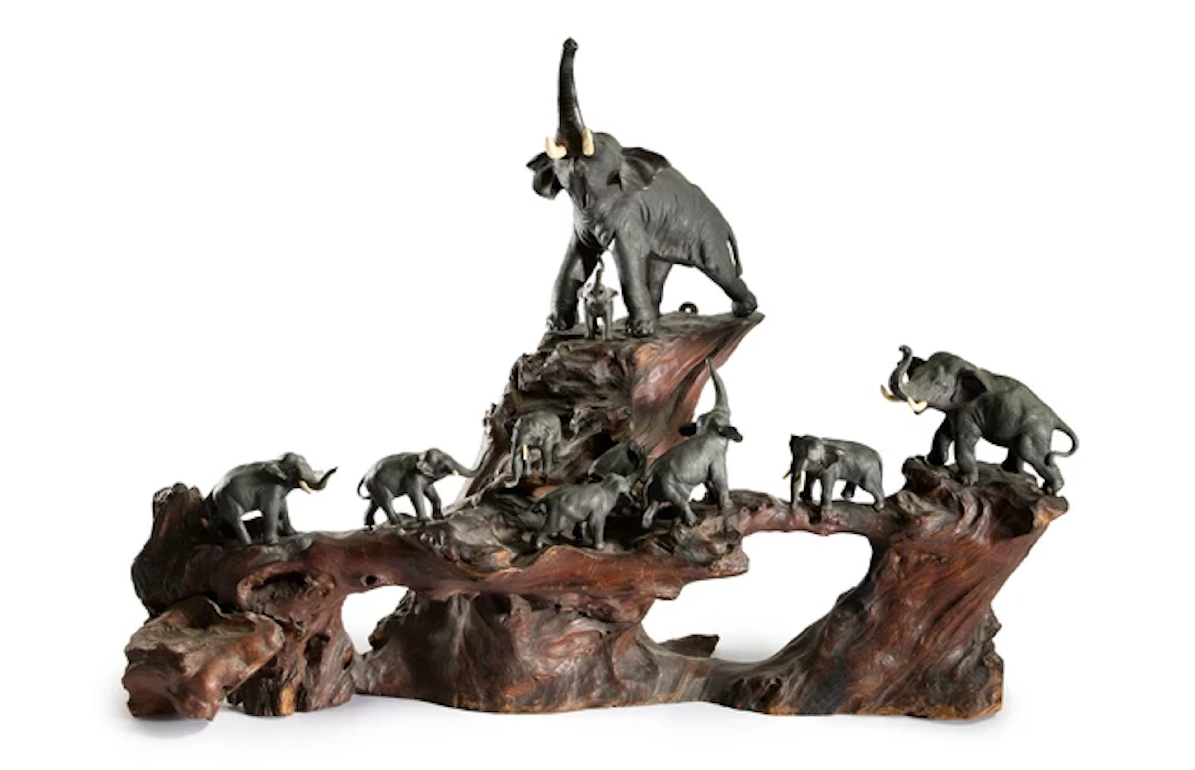 A Japanese bronze okimono group of elephants with fitted...