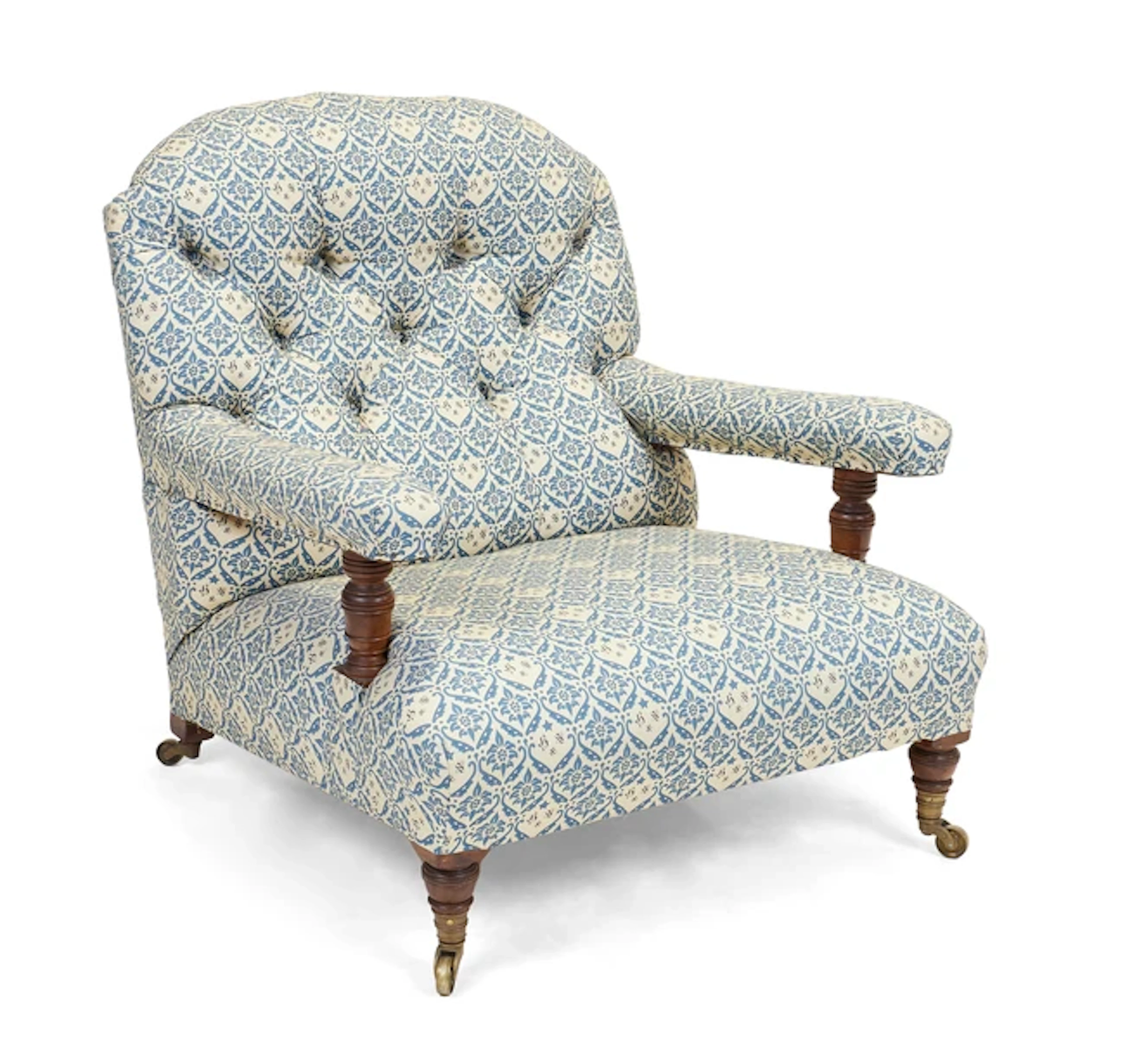 A Victorian Howard & Sons walnut open armchair