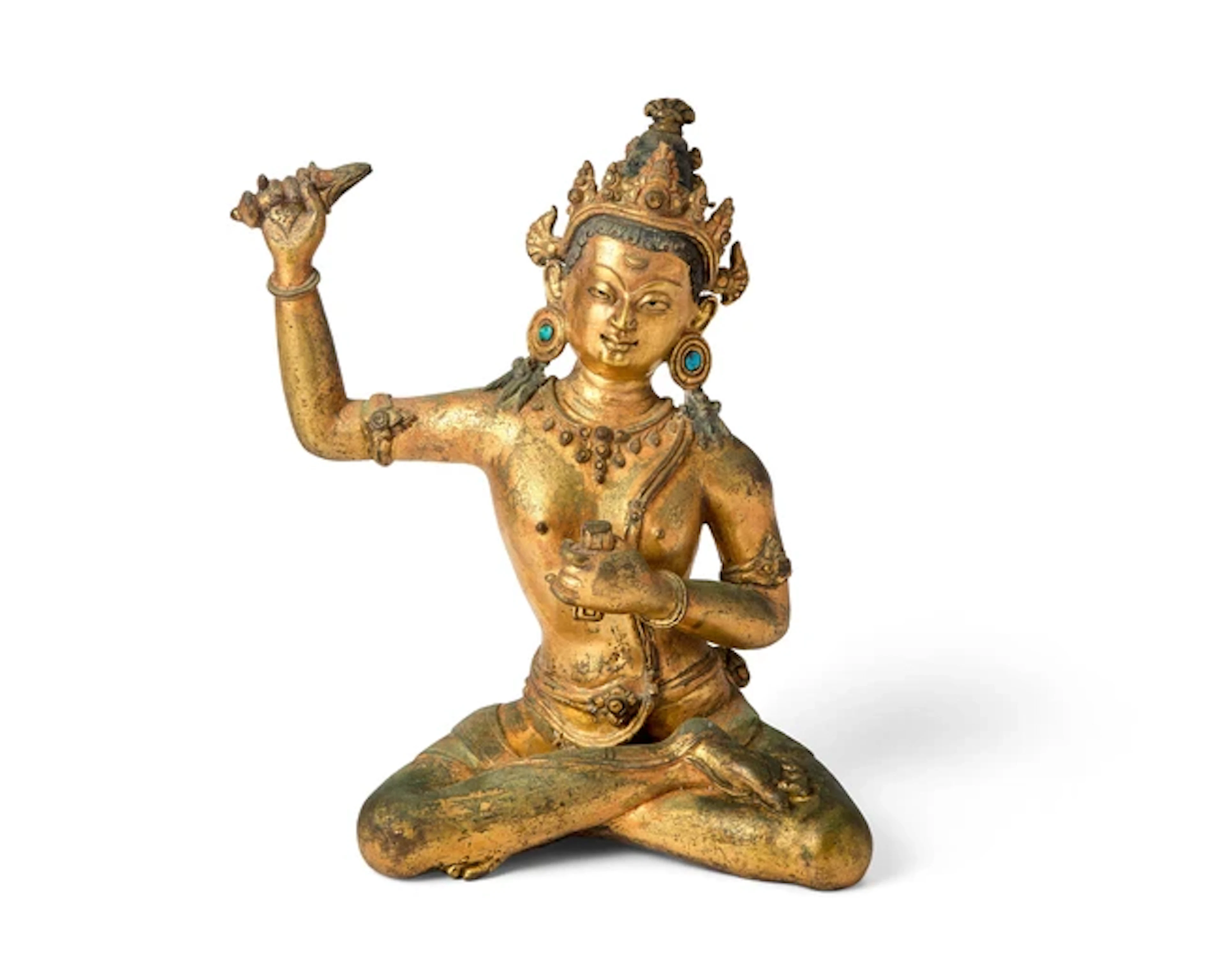 A Nepalese gilt-bronze figure of seated Bodhisattva...