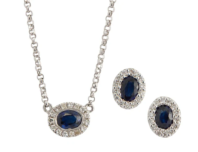 A sapphire and diamond necklace and ear stud set