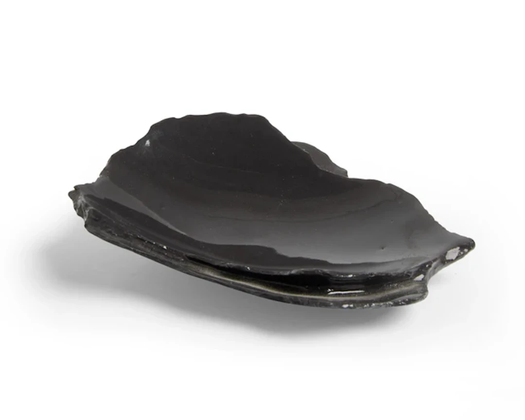 A sculpted and slip-cast black porcelain ceramic