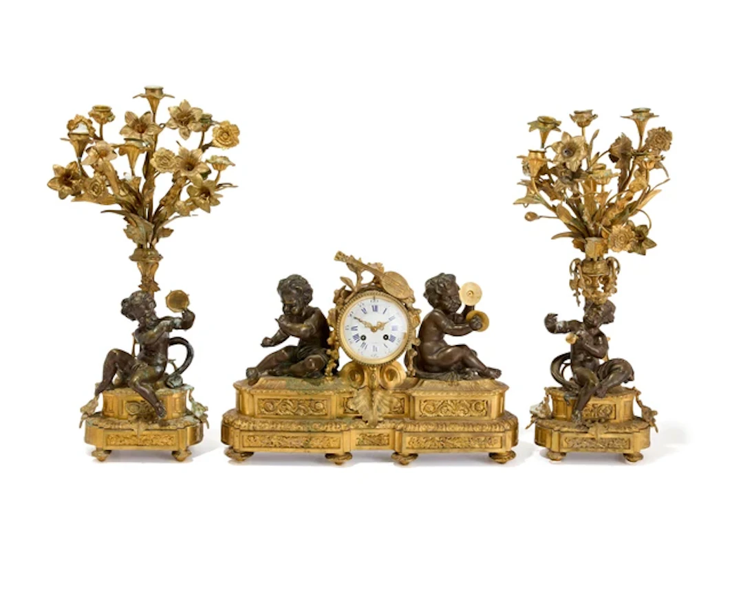 A Napoleon III gilt and patinated bronze garniture