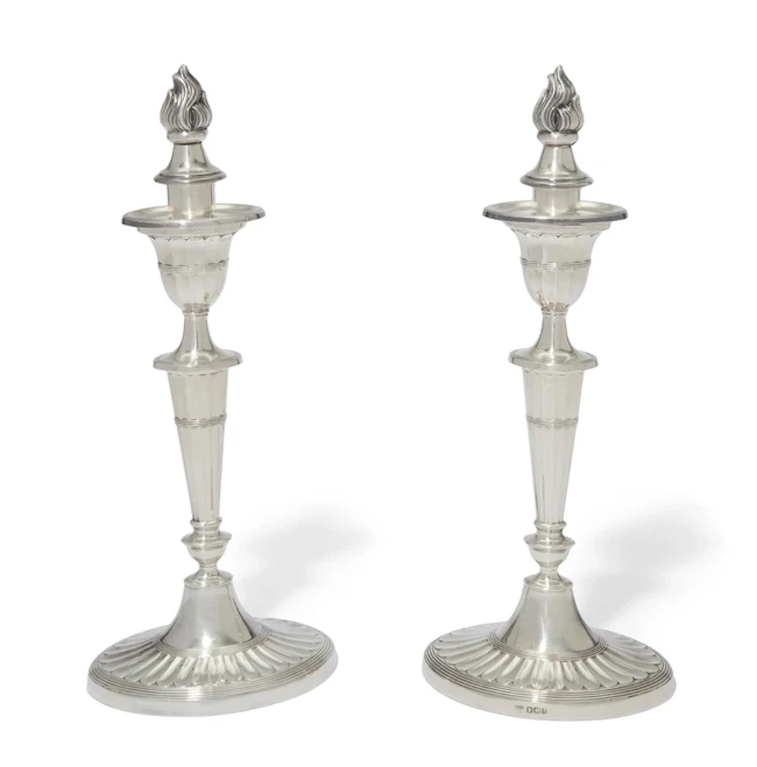 A pair of Elizabeth II silver candlesticks