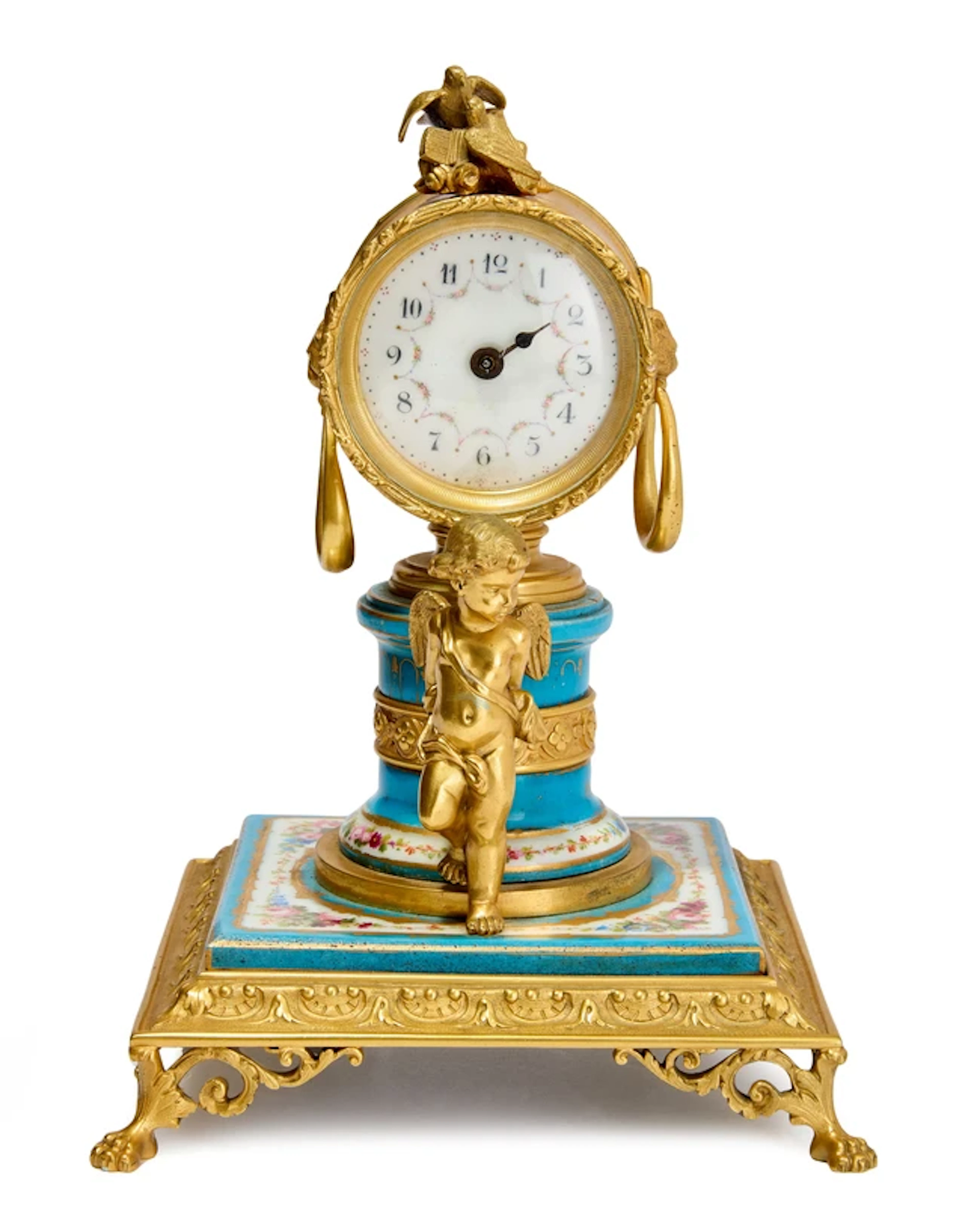 A French Sevres style porcelain and gilt-bronze drumhead timepiece