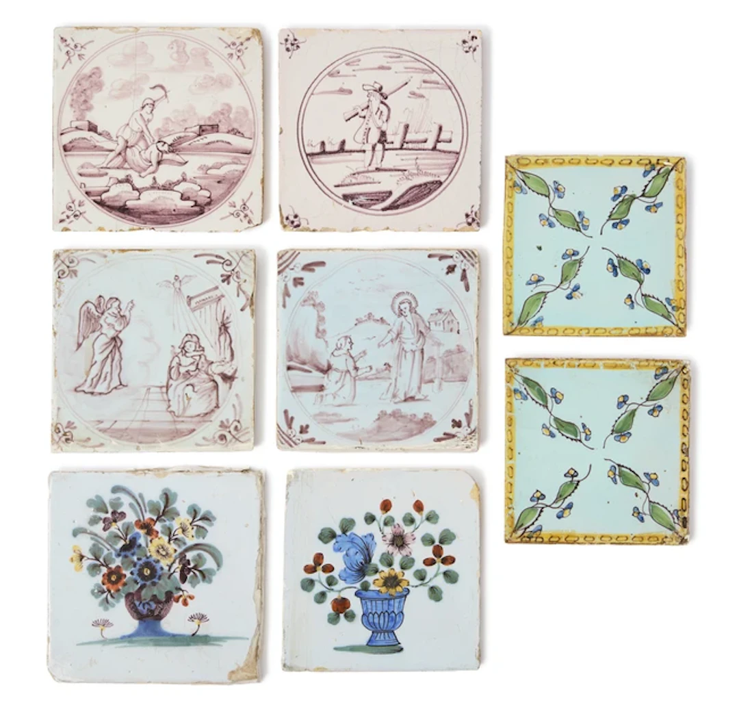 A group of eight English and Dutch tiles