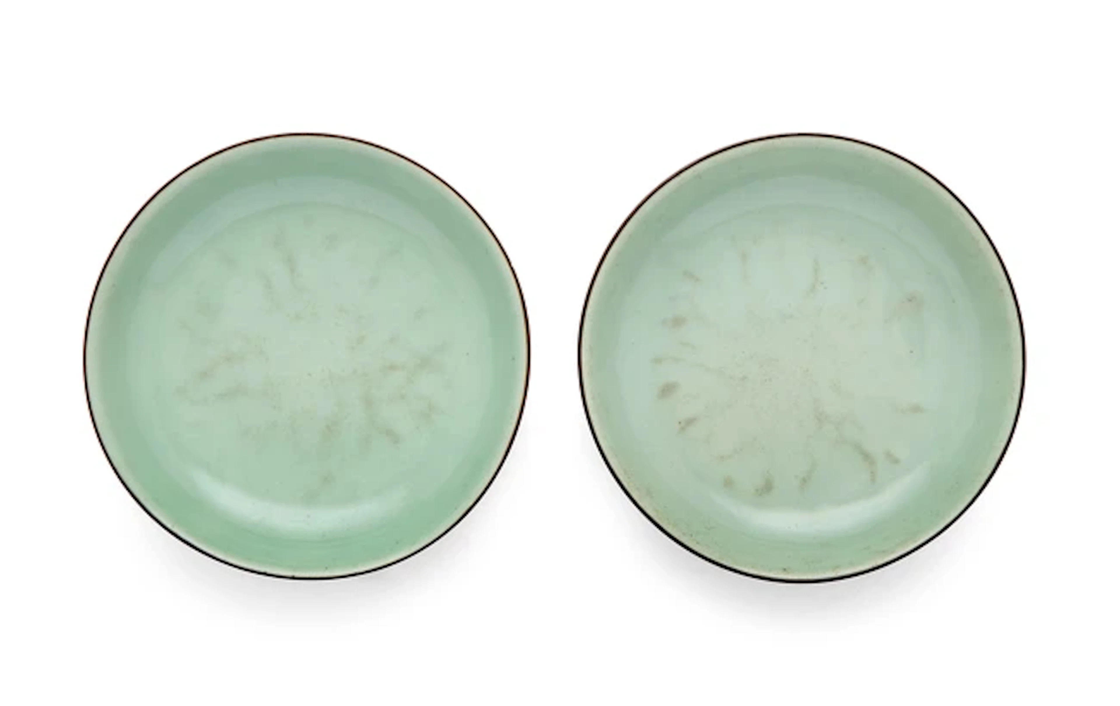 A pair of Chinese celadon glazed dishes Qing dynasty