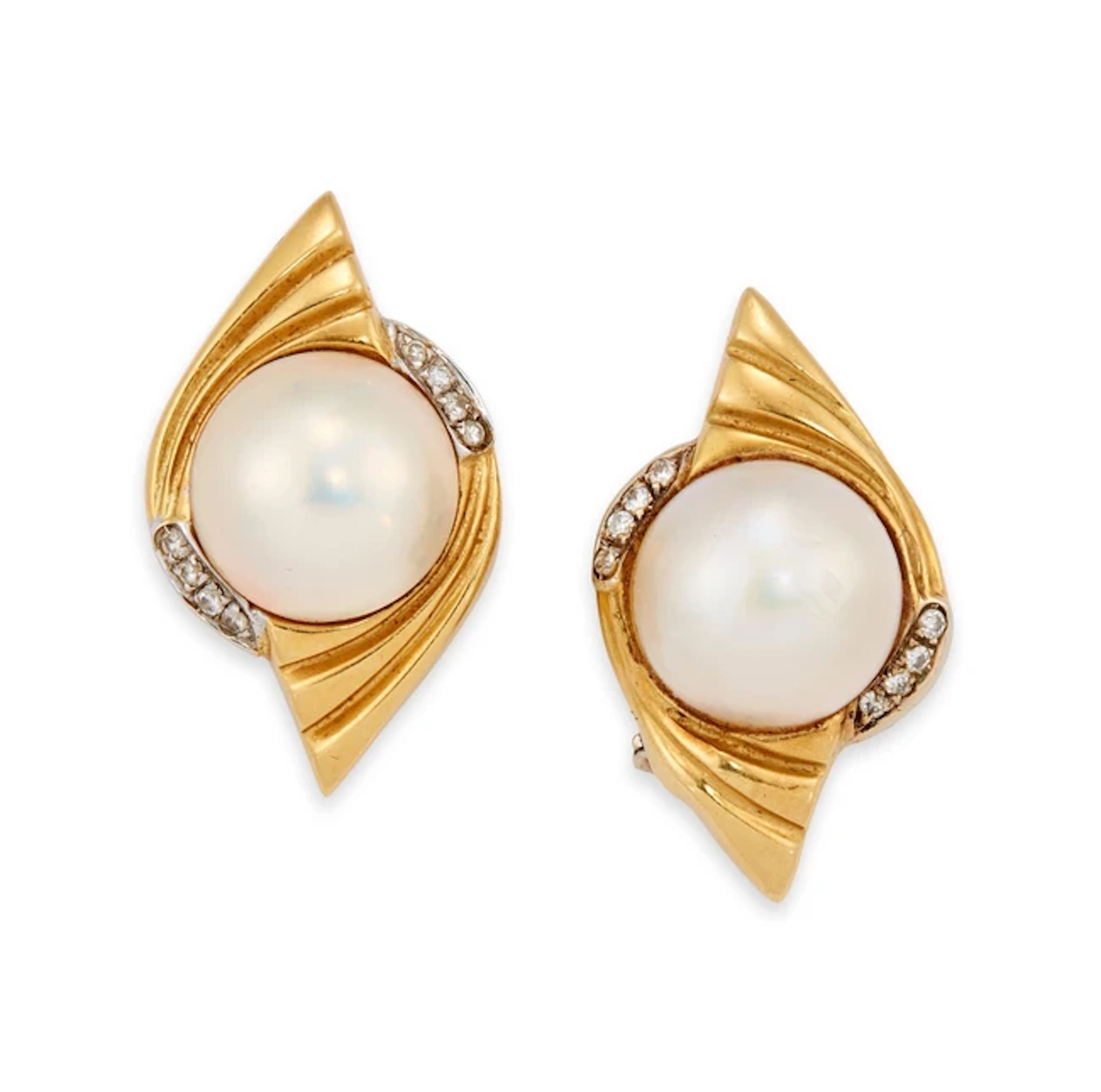 A pair of mabé pearl and diamond earclips