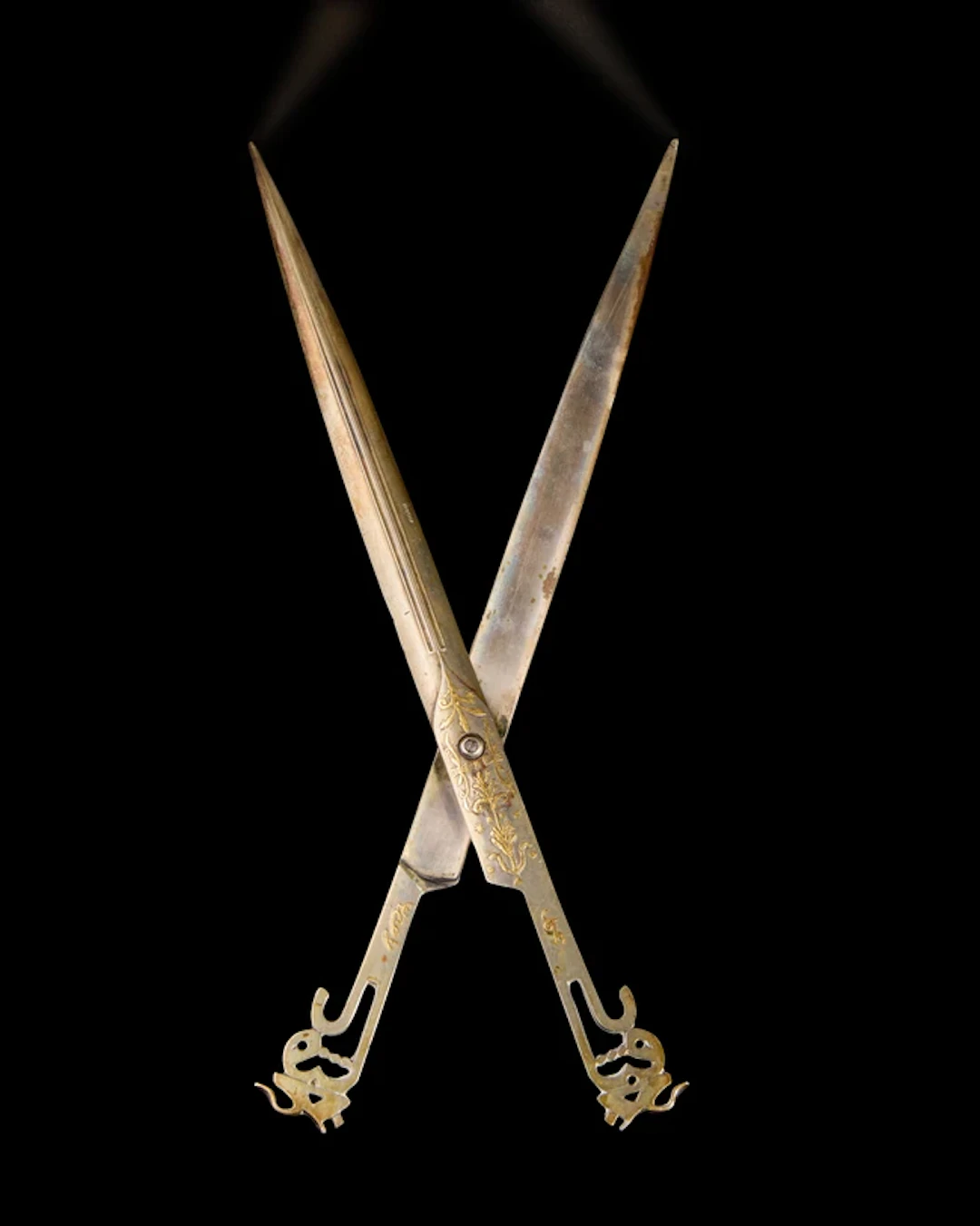An overlaid calligrapher's scissors